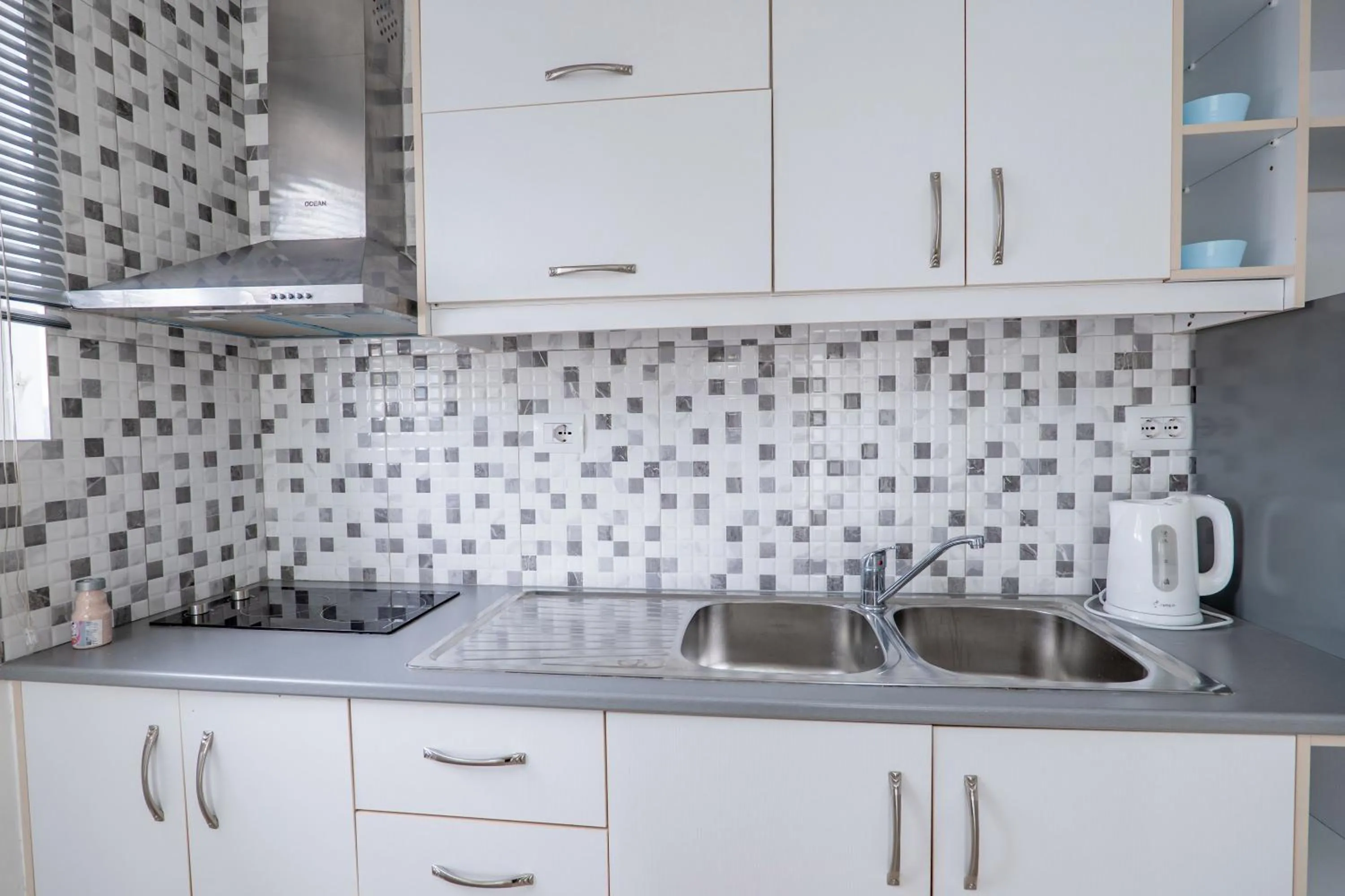 Kitchen or kitchenette in Gregory's Apartments