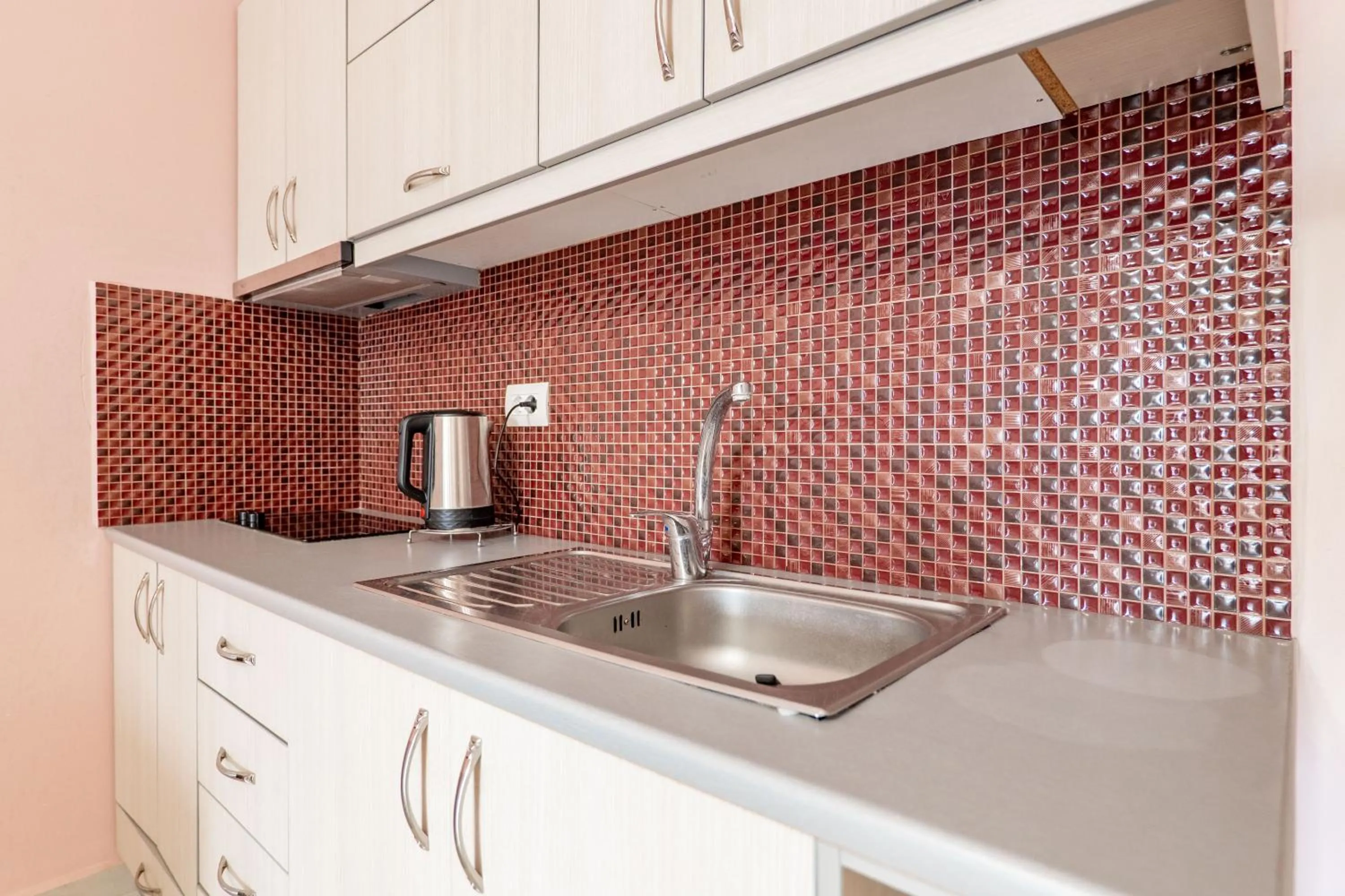 Kitchen or kitchenette in Gregory's Apartments