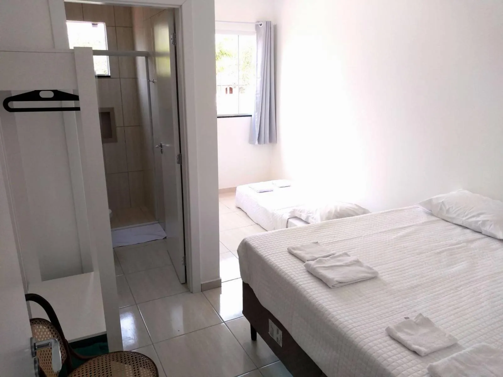 Bed in Pousada Pontal do Sul