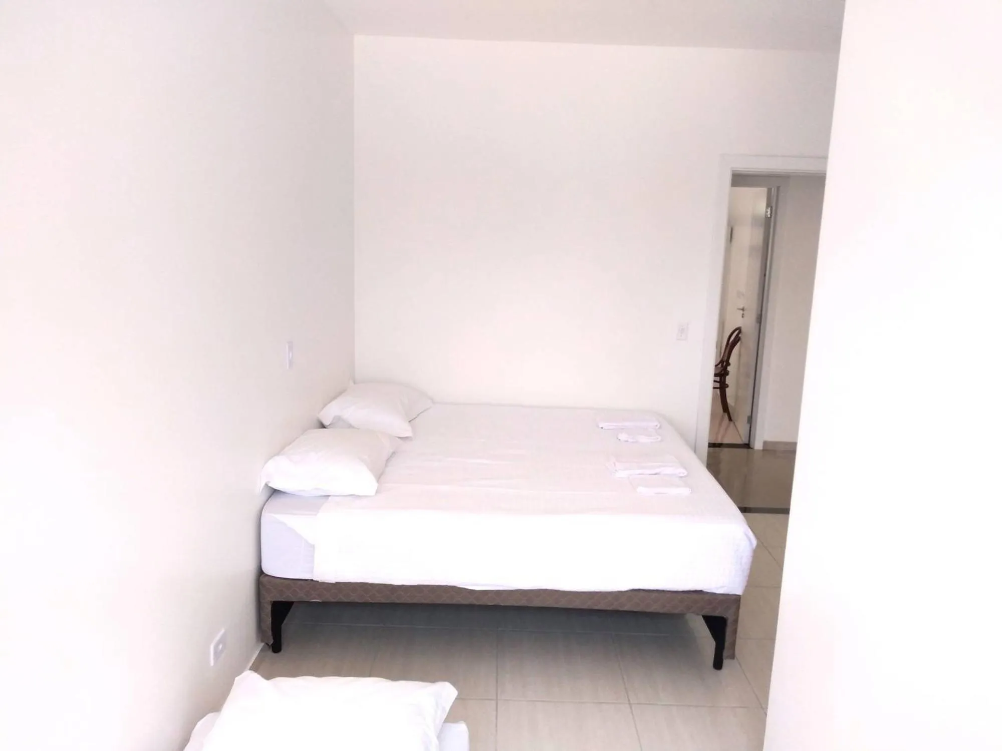 Bed in Pousada Pontal do Sul