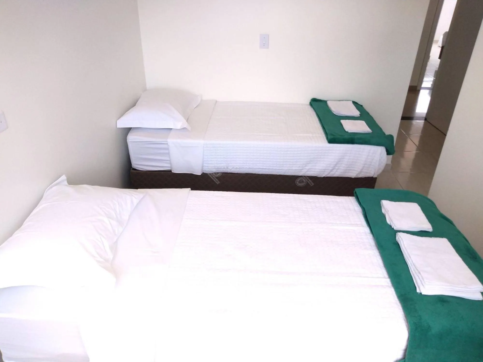 Bed in Pousada Pontal do Sul