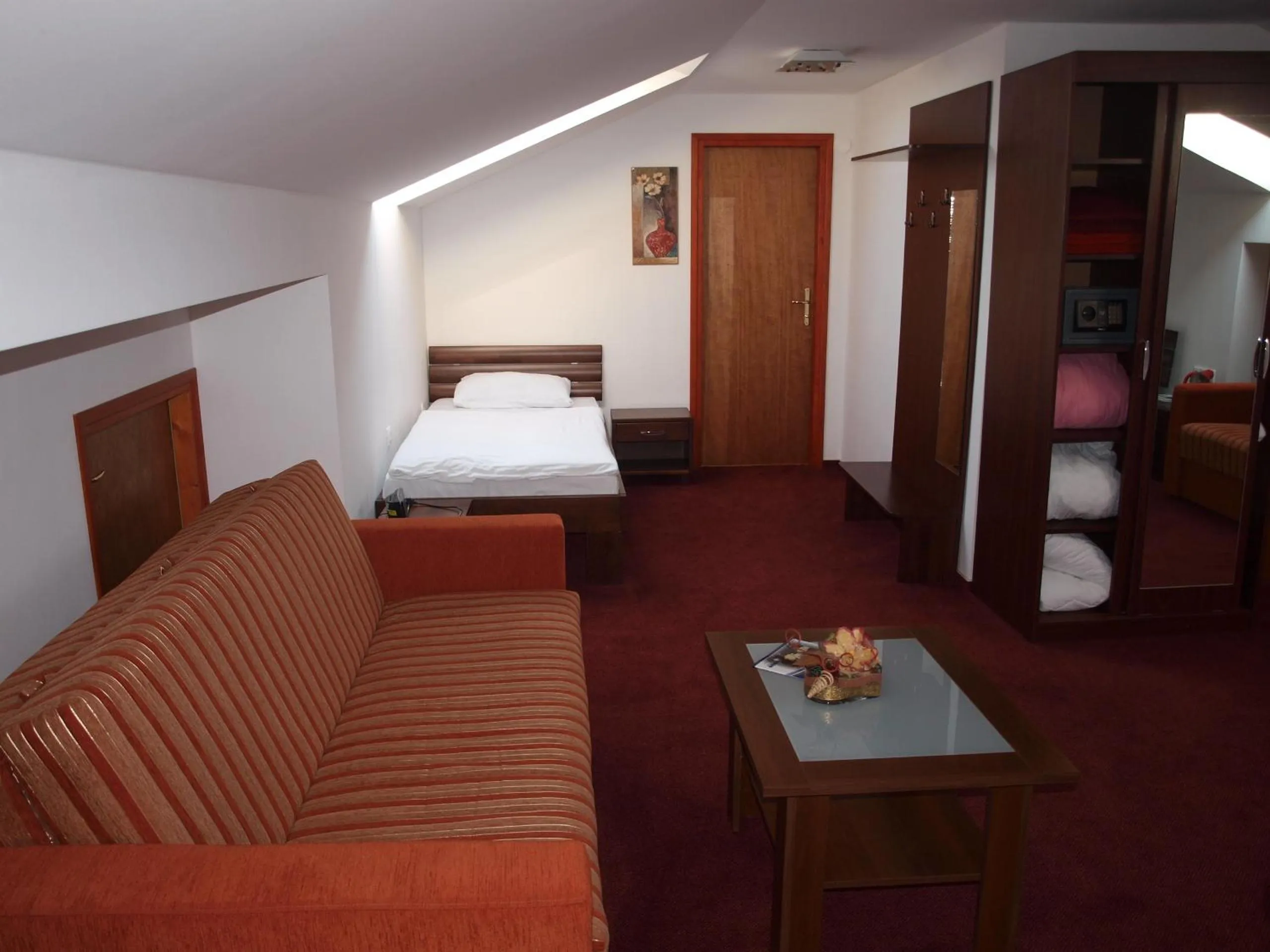 Toilet, Bed in Hotel Orion