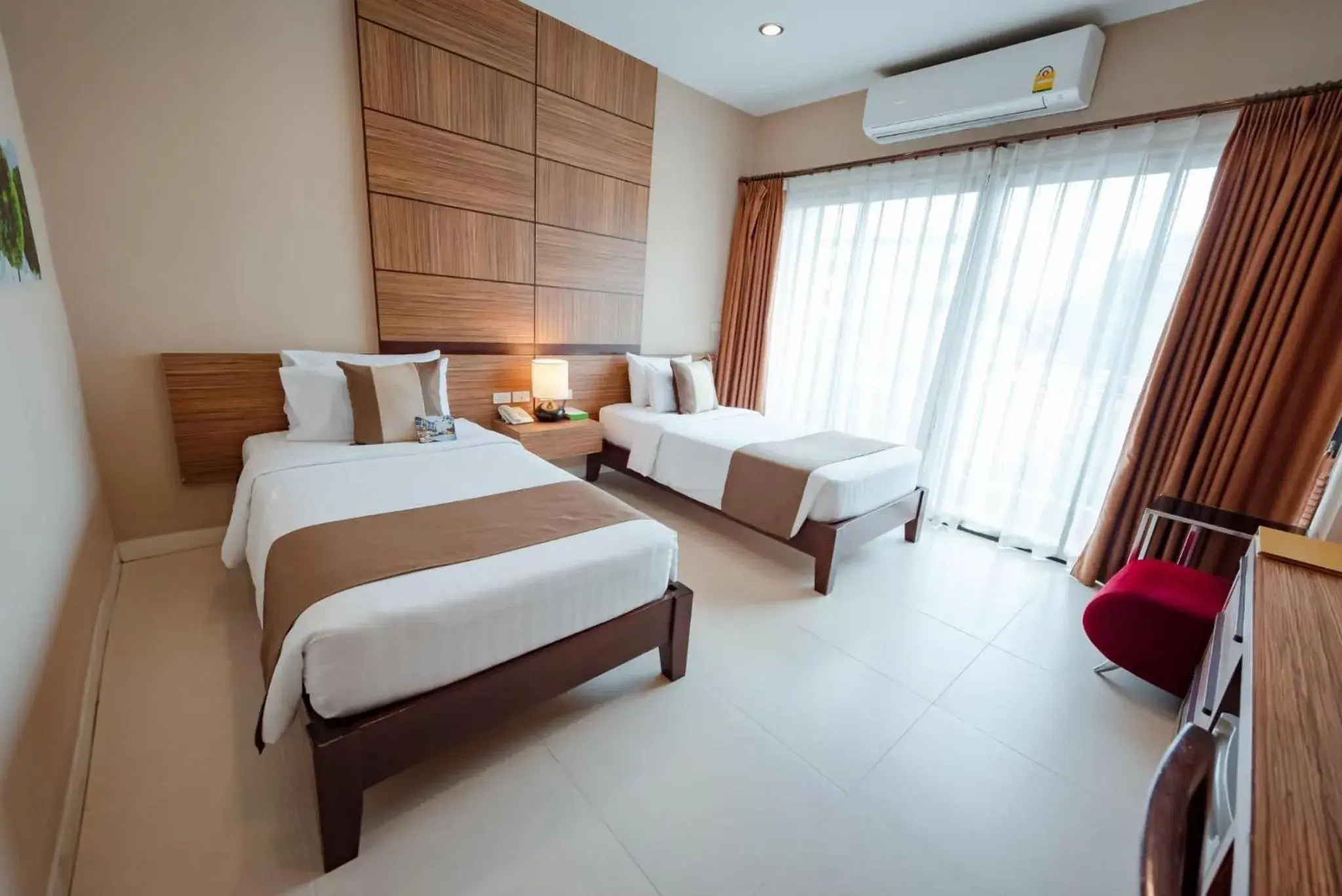 Bed in The Pannarai Hotel Bed in The Pannarai Hotel