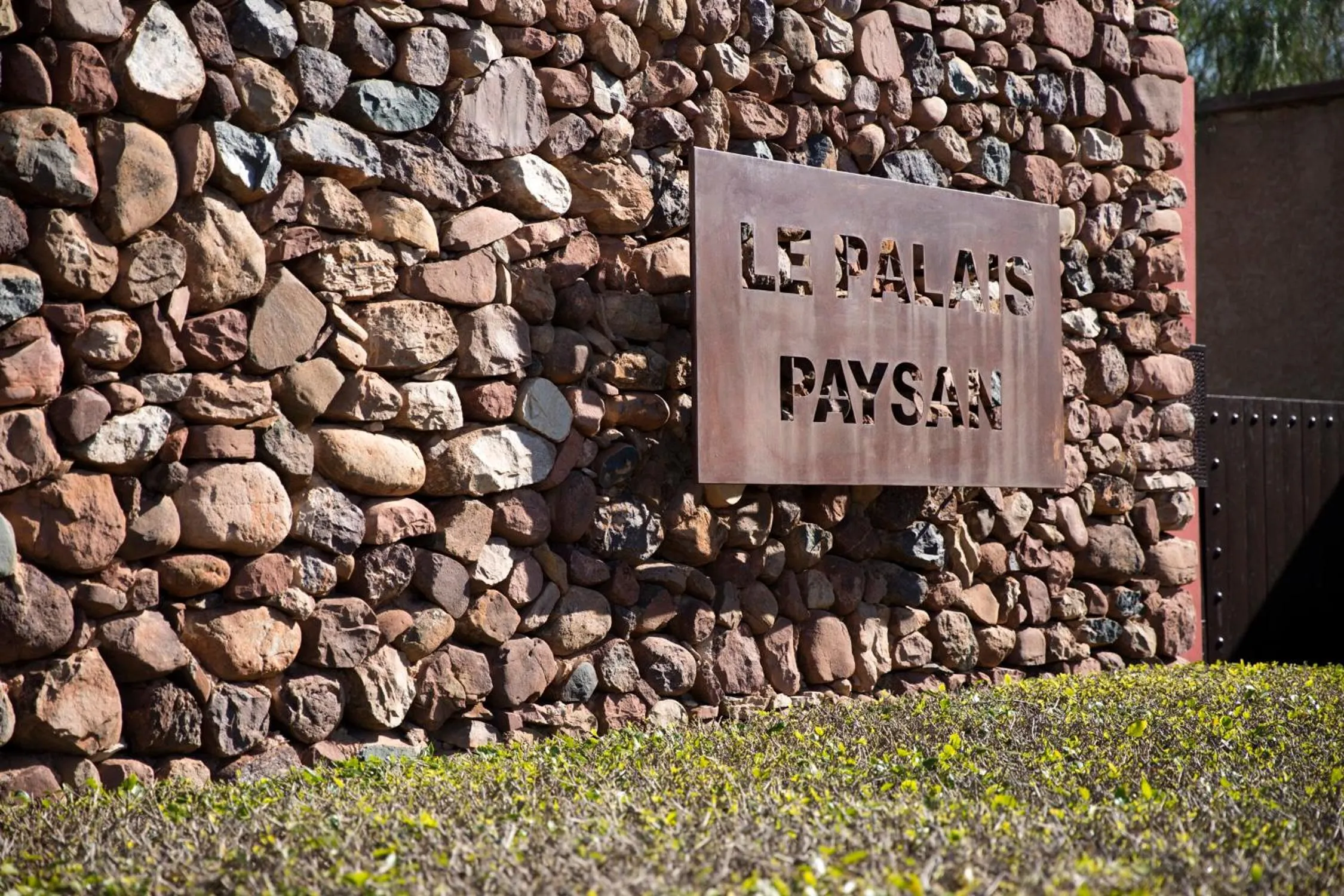 Property logo or sign in Le Palais Paysan