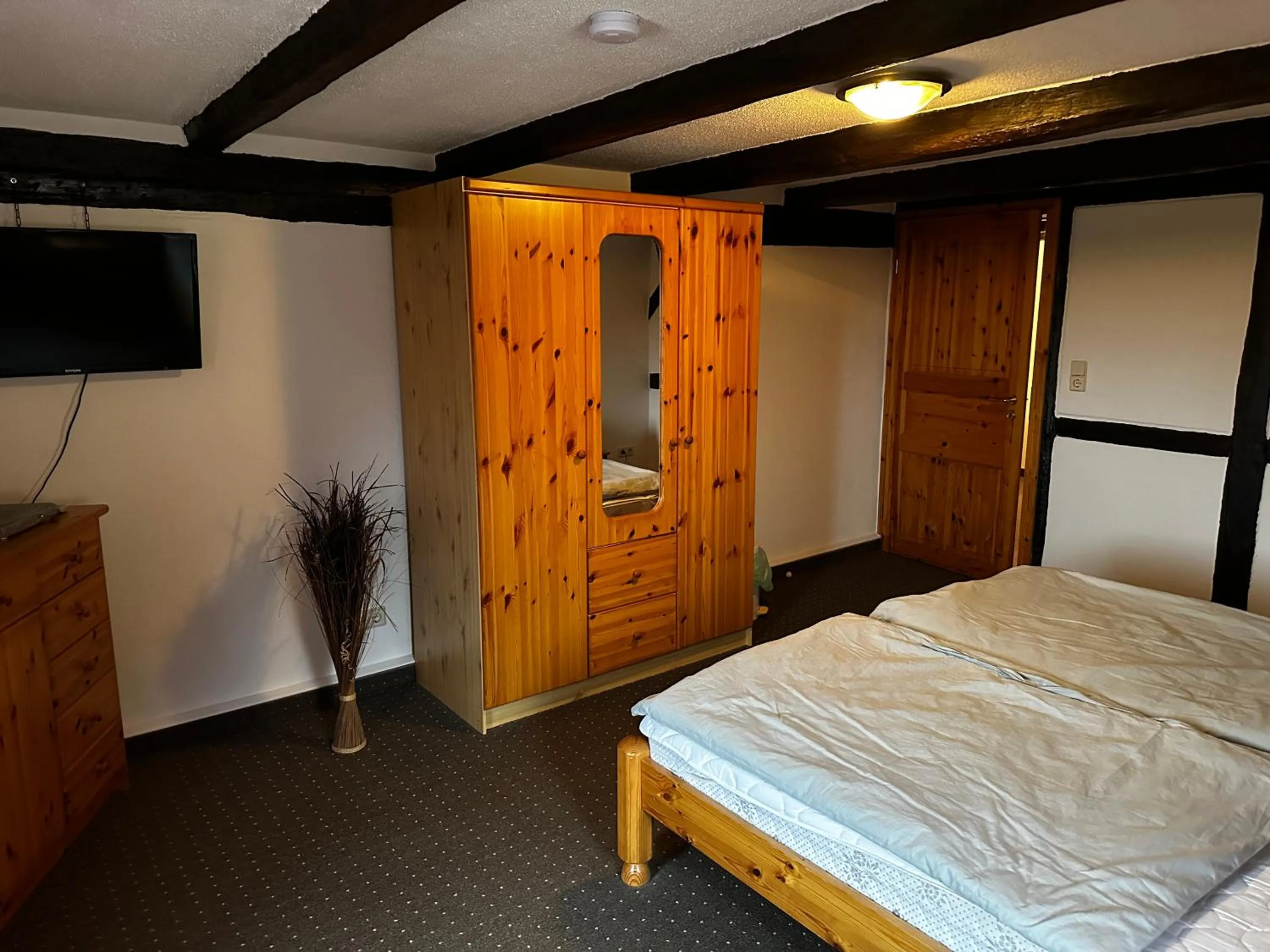 Bedroom in Pension Zum Fäßchen