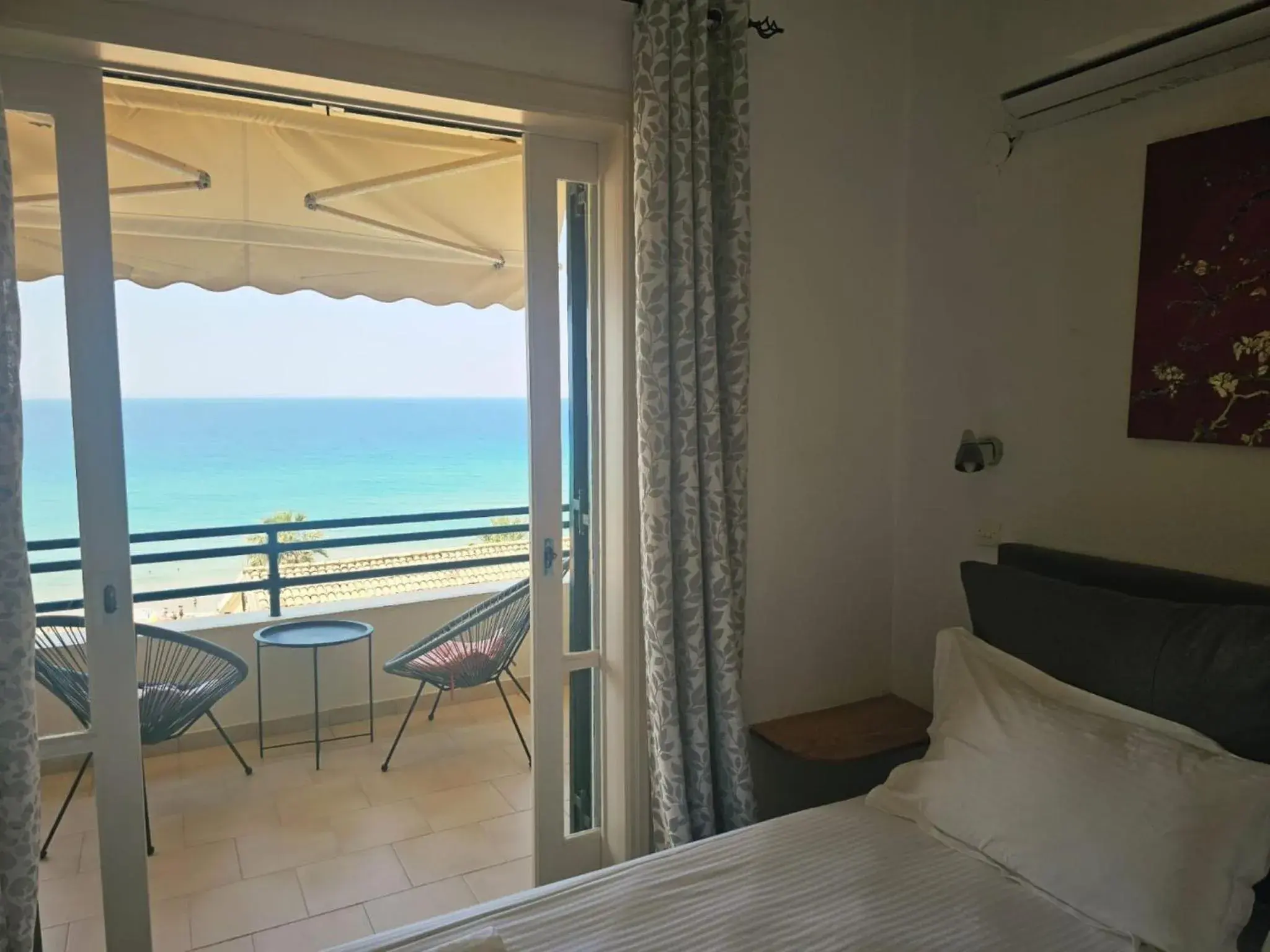 Balcony/Terrace, Bed in Corfu Glyfada Menigos Resort 91 Balcony/Terrace, Bed in Corfu Glyfada Menigos Resort 91