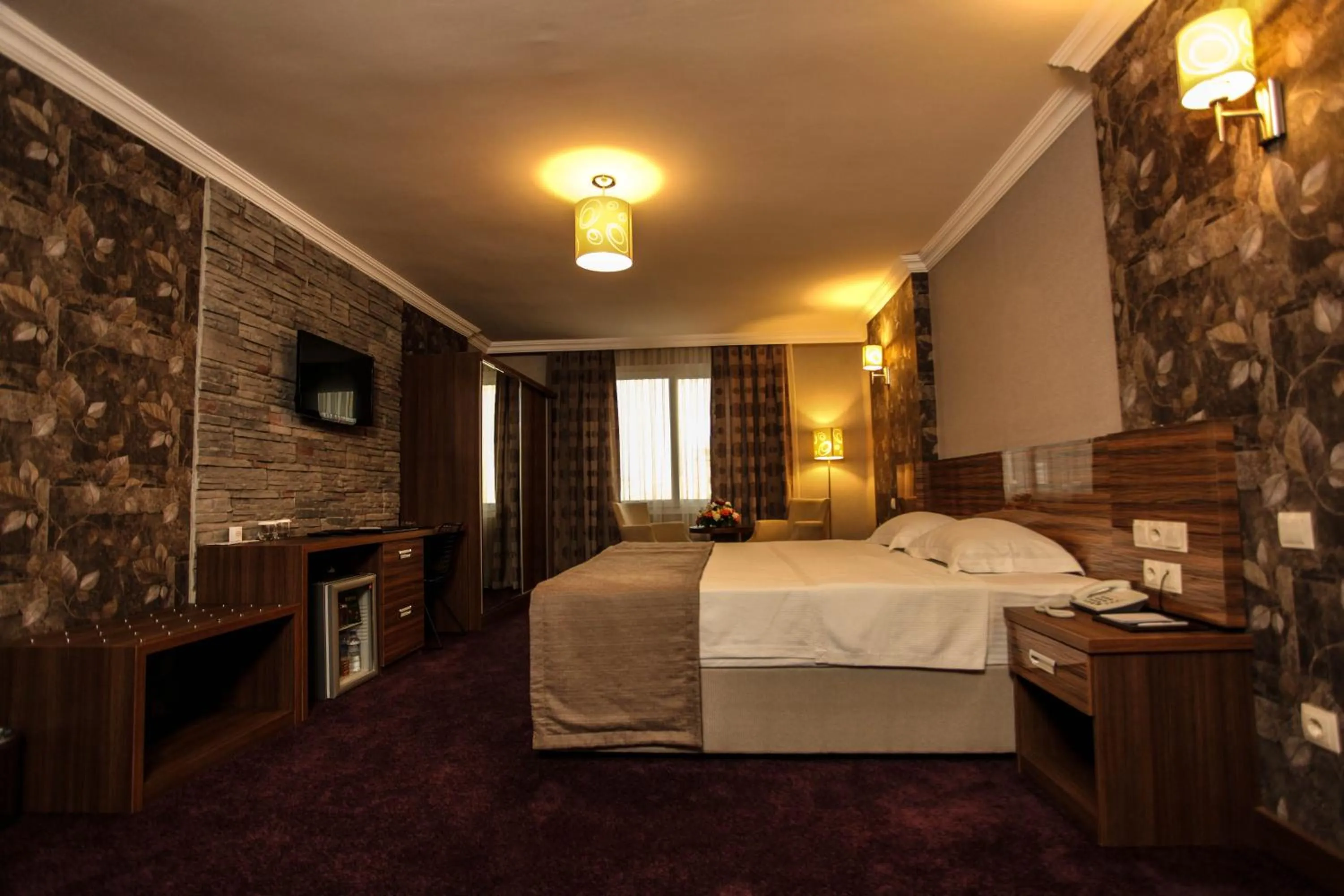 Photo of the whole room, Bed in Grand Akçalı Otel