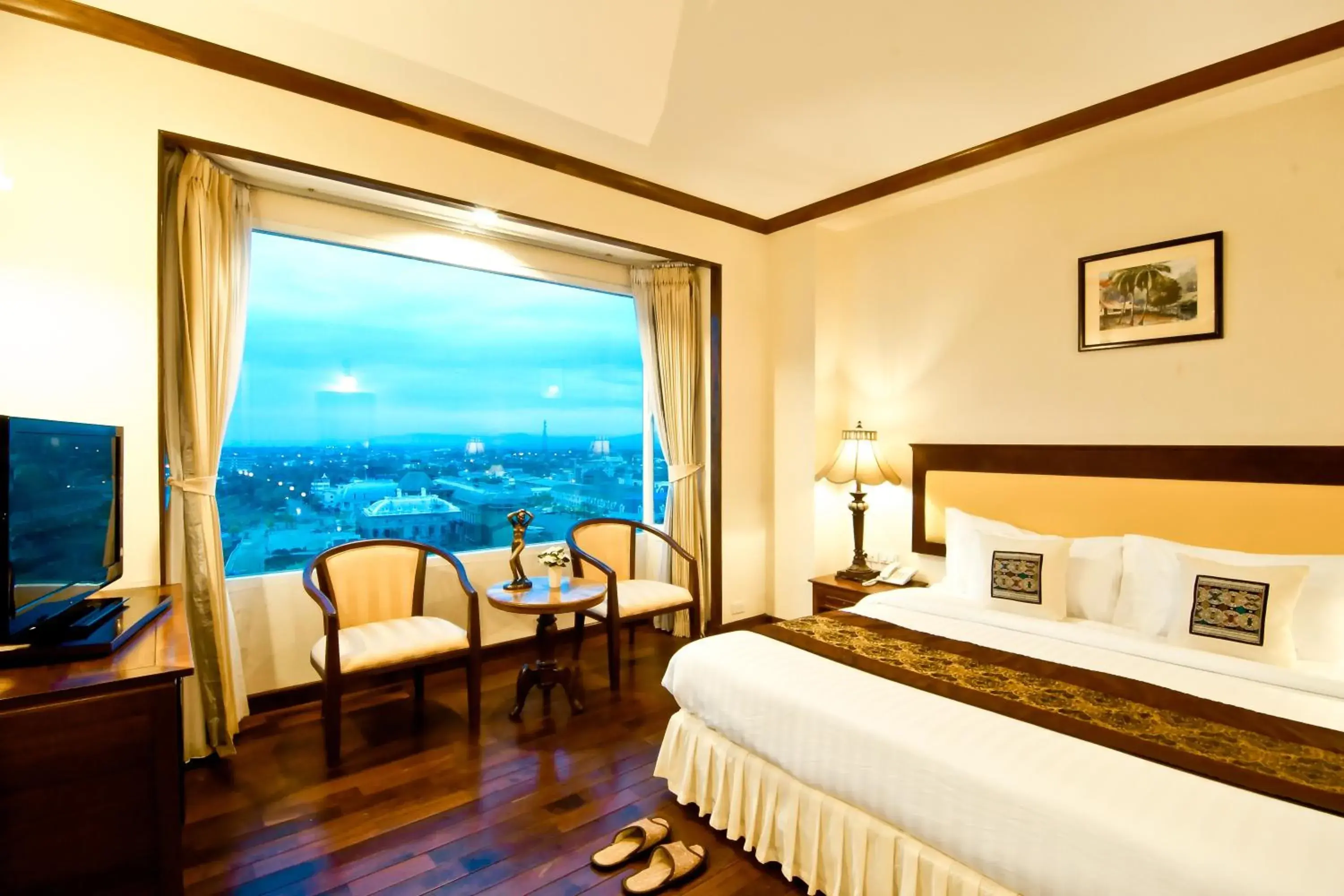 Bed in Champasak Grand Hotel Bed in Champasak Grand Hotel