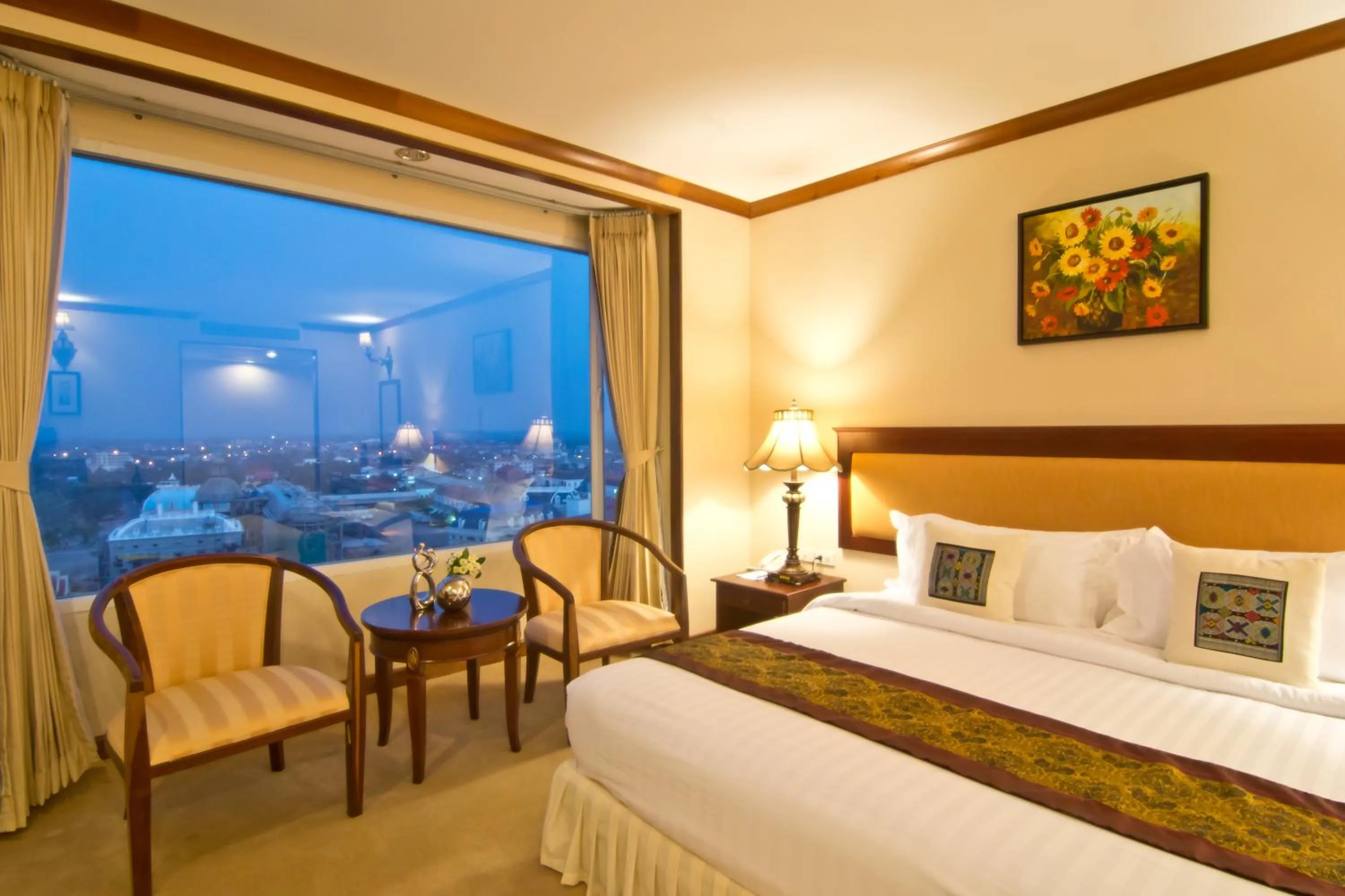 Bed in Champasak Grand Hotel