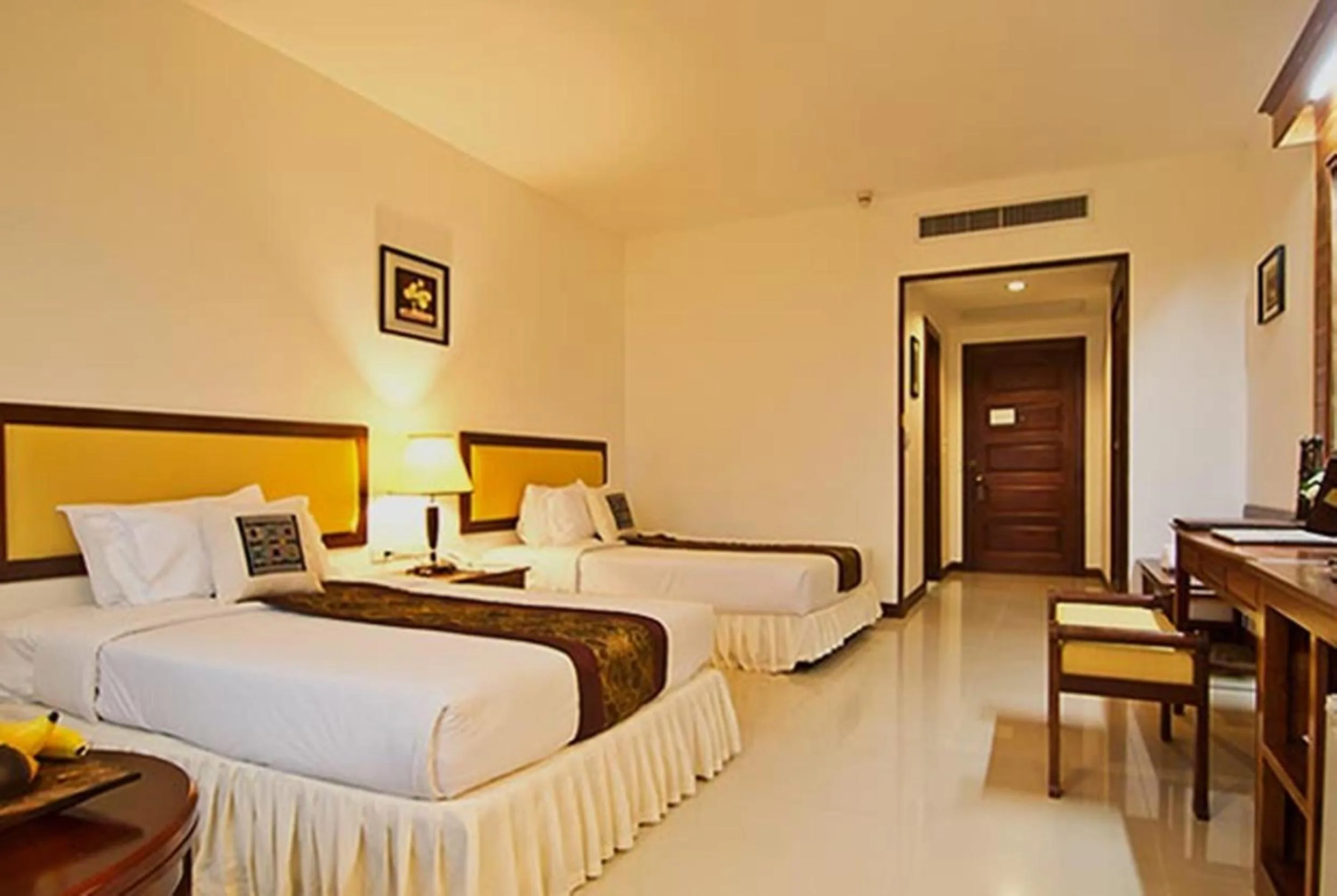 Bed in Champasak Grand Hotel