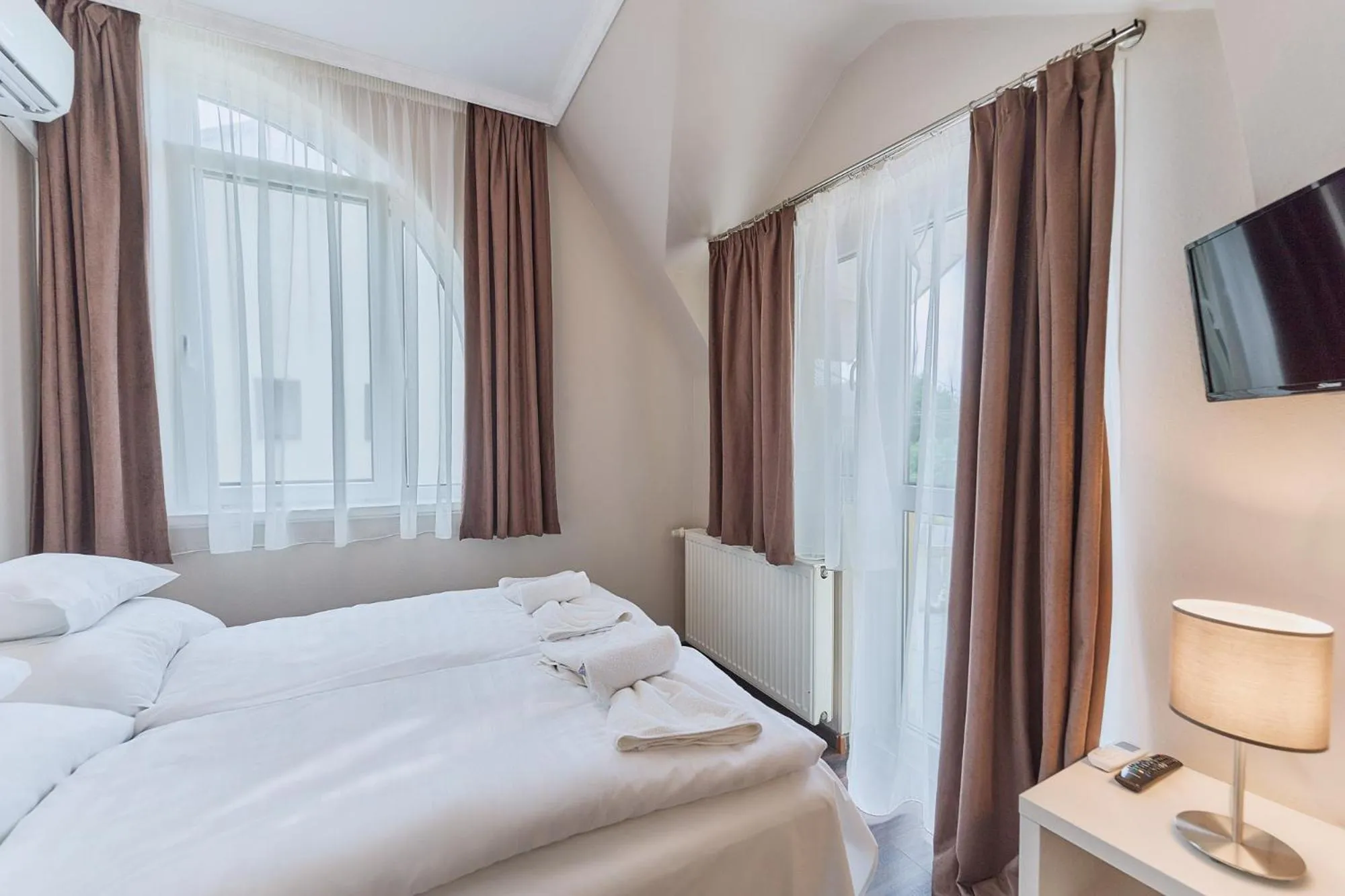 Bed in Tokajer Wellness Panzió