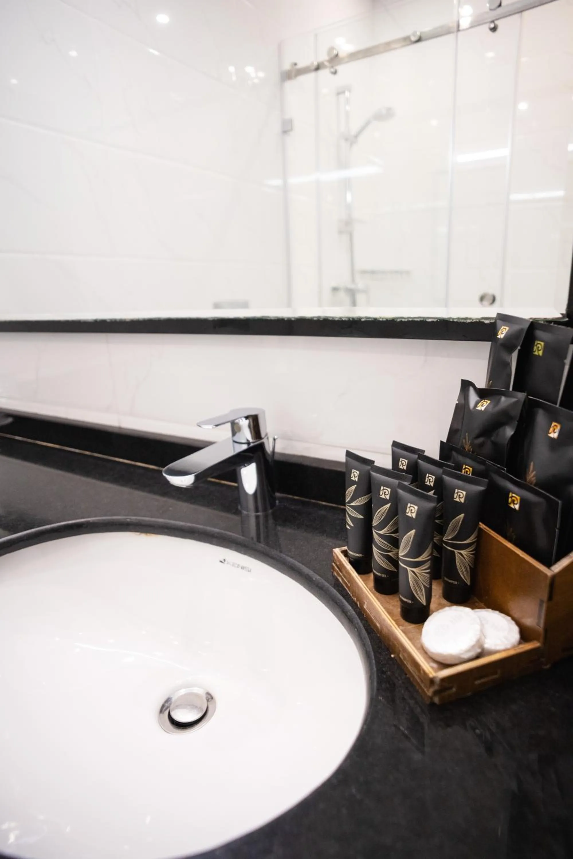 Shower in Resident City Hotel