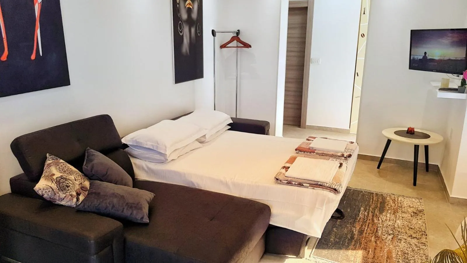 Living room, Bed in Apartments Nancy