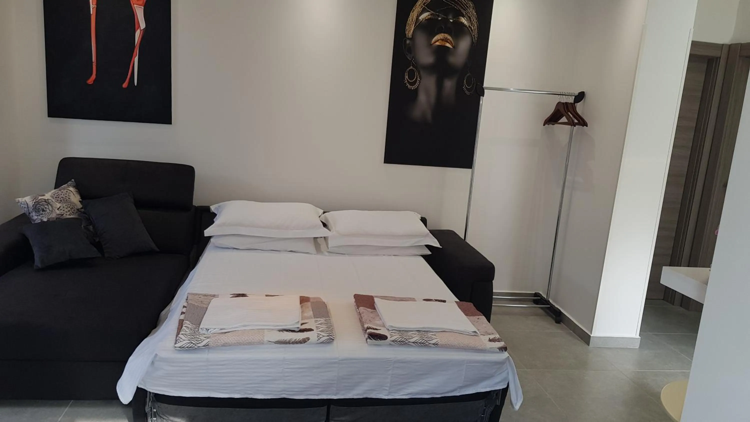 Living room, Bed in Apartments Nancy