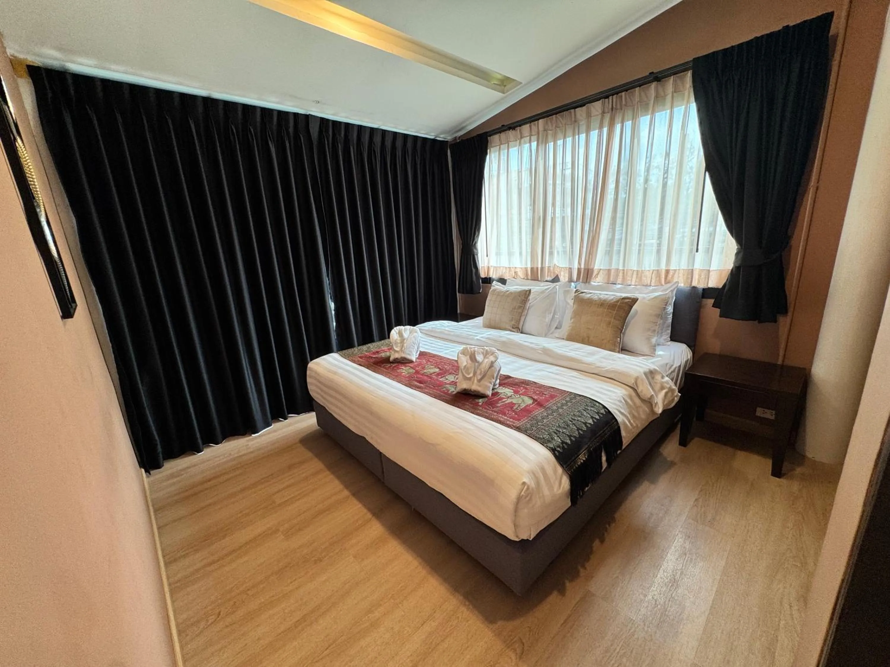 Bed in Naiyang Discovery Beach Resort