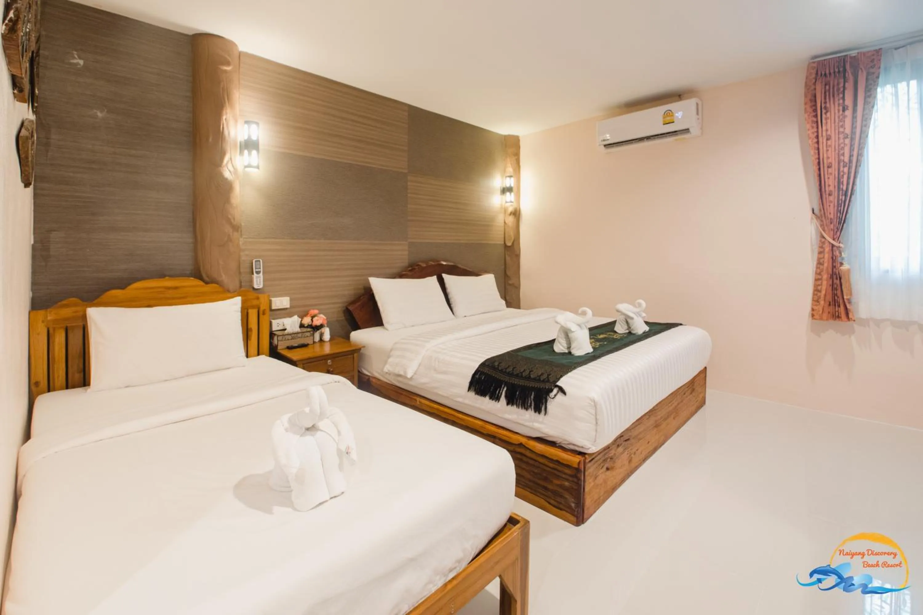 Bed in Naiyang Discovery Beach Resort
