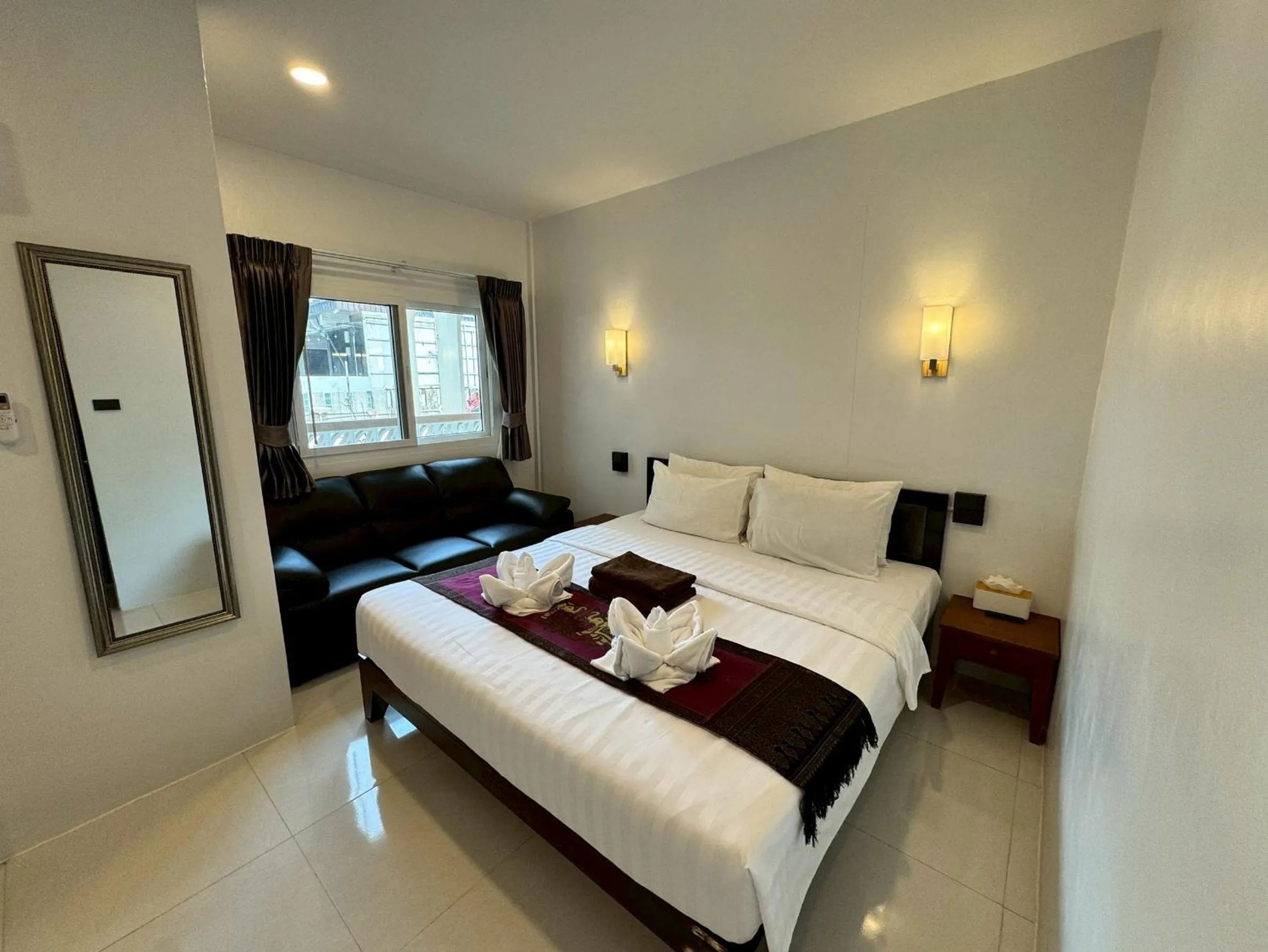 Bed in Naiyang Discovery Beach Resort