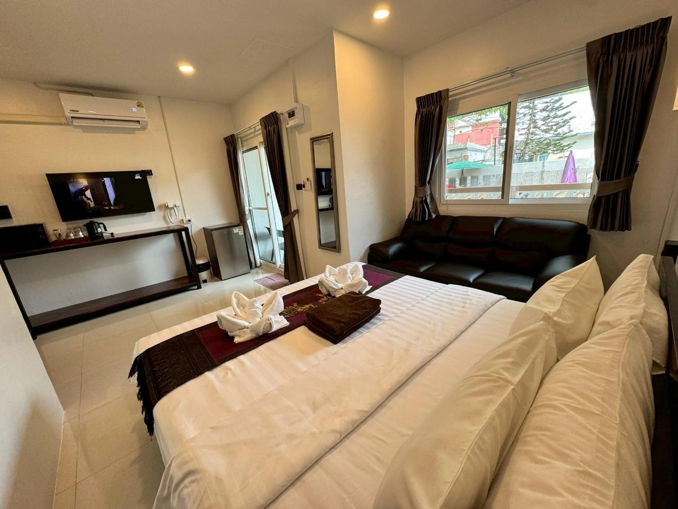 Bed in Naiyang Discovery Beach Resort