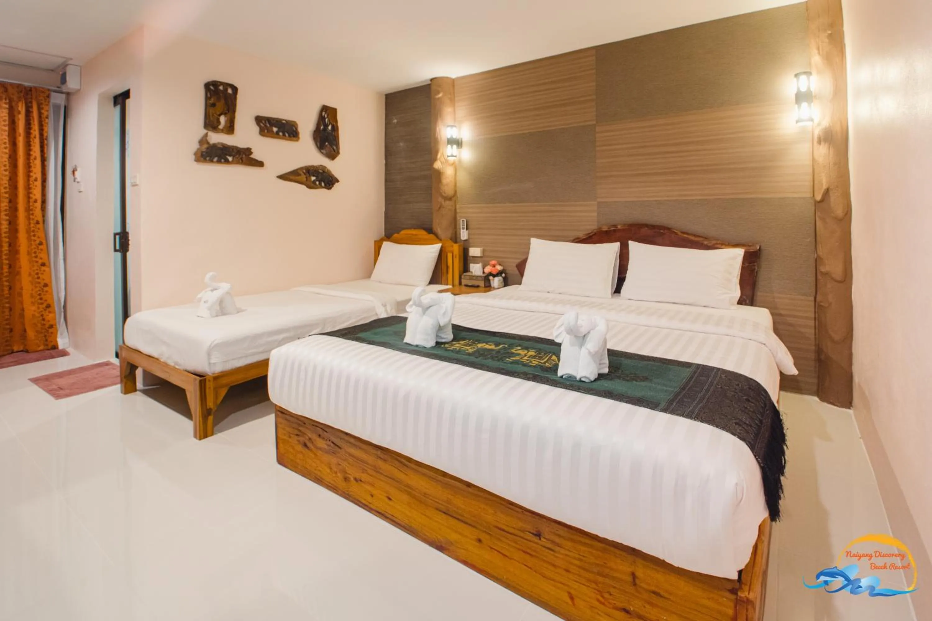 Bed in Naiyang Discovery Beach Resort