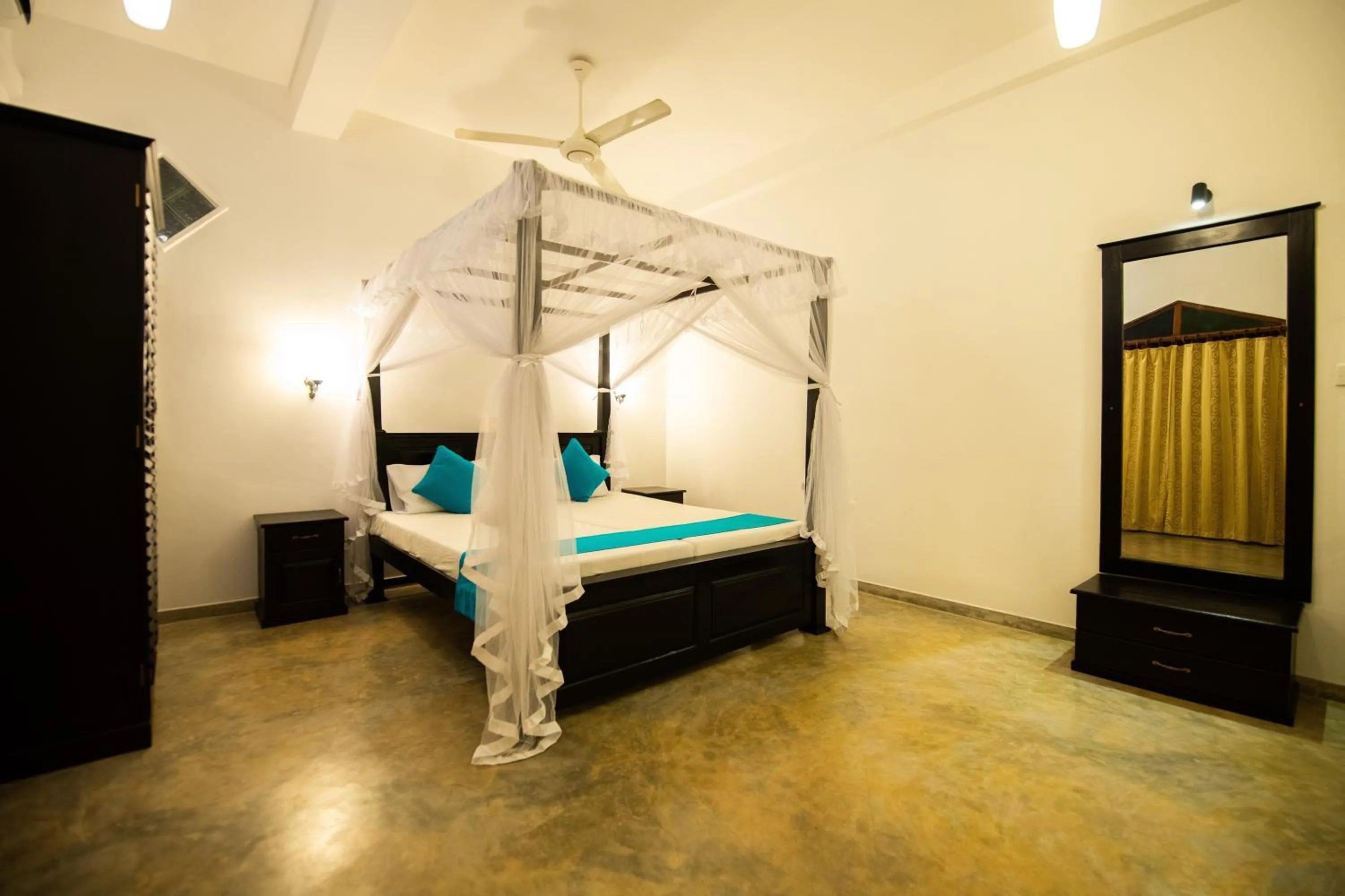 Bed in International Beach Hotel & Restaurant