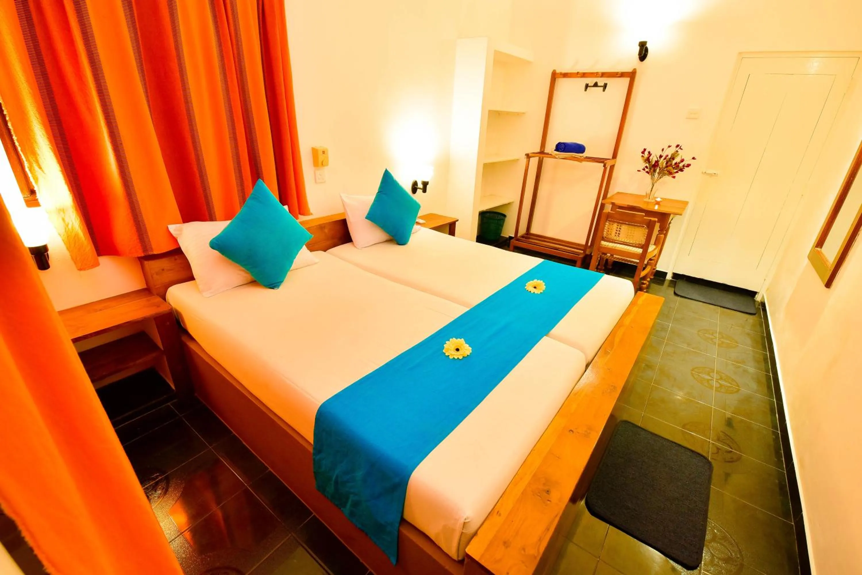 Bed in International Beach Hotel & Restaurant