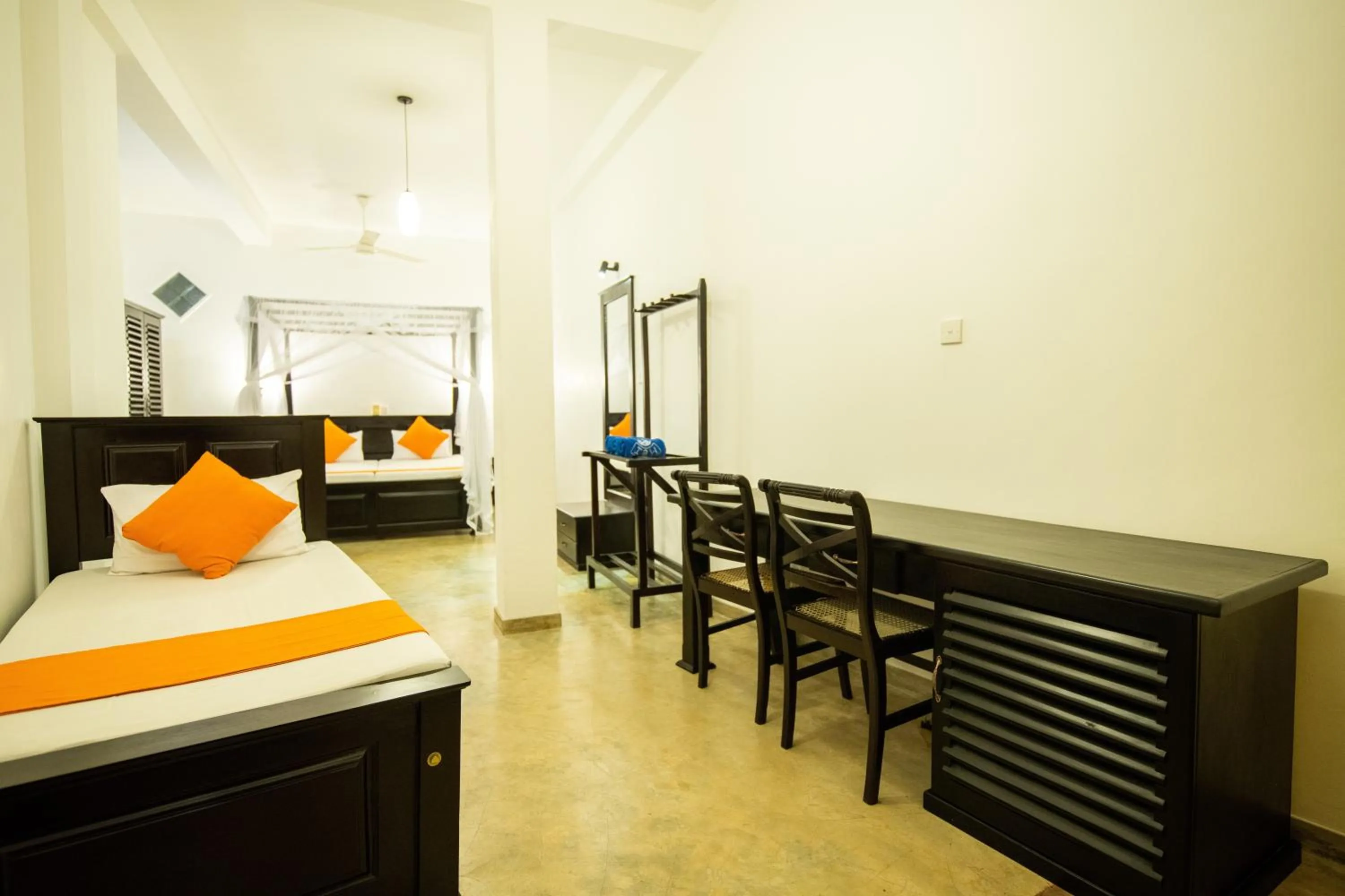 Bed in International Beach Hotel & Restaurant