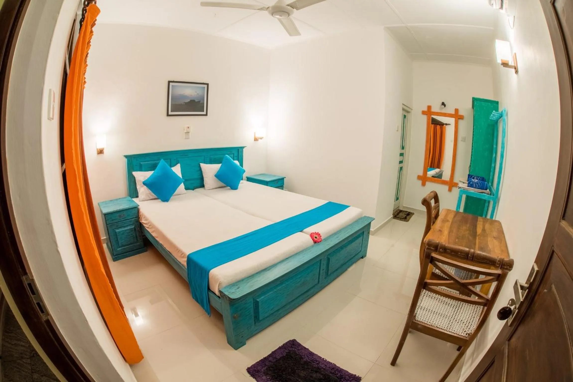 Bed in International Beach Hotel & Restaurant