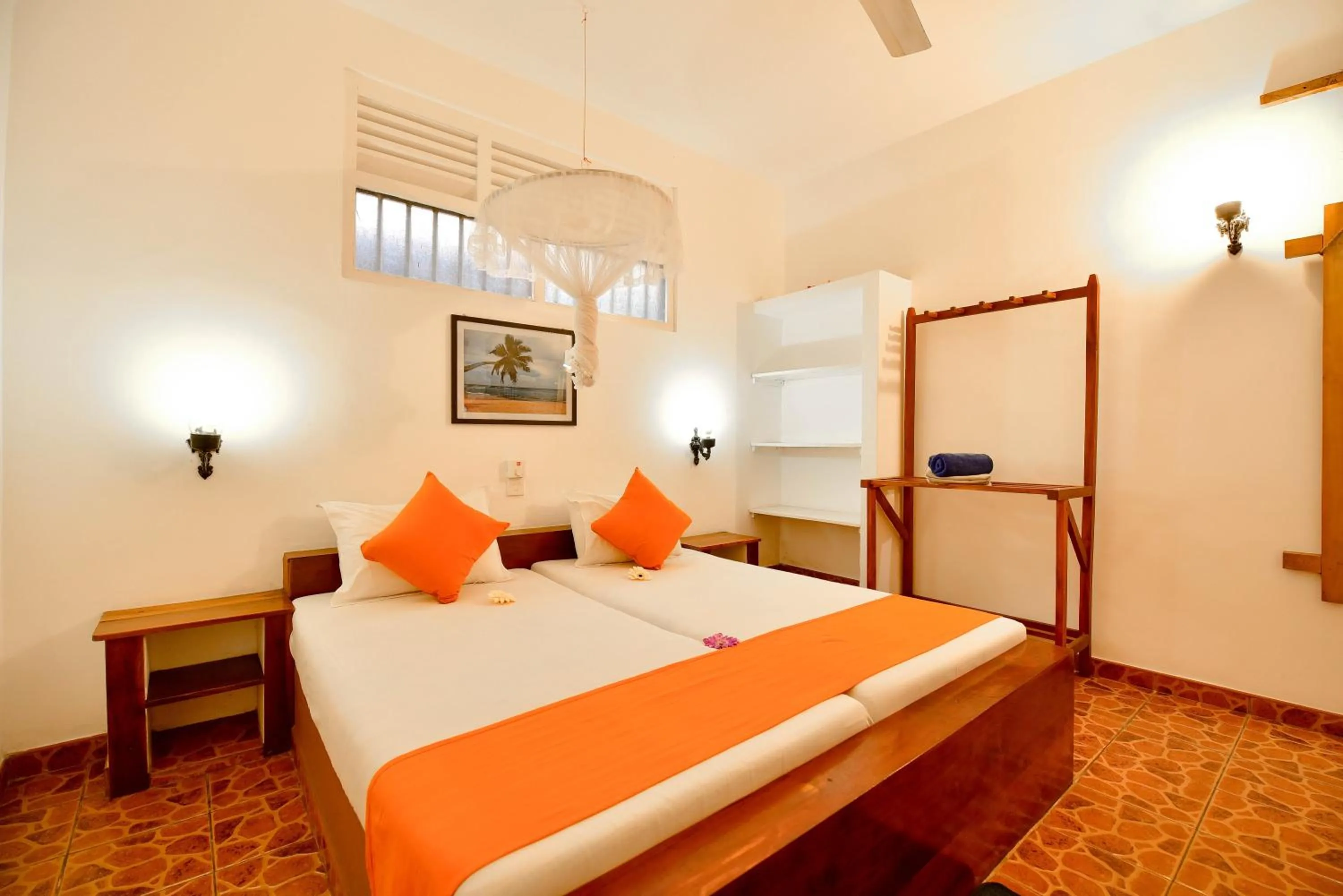 Bed in International Beach Hotel & Restaurant