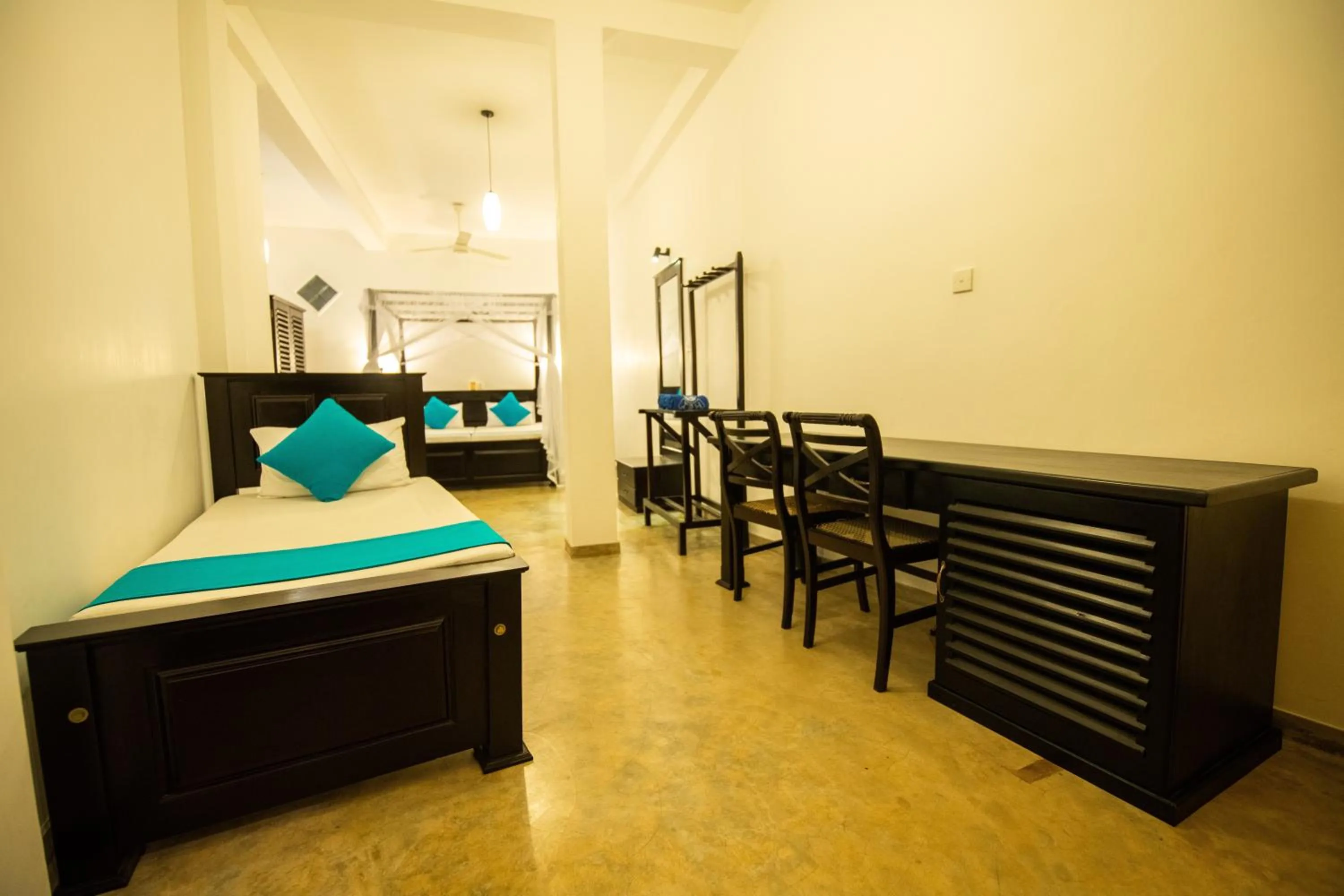 Bed in International Beach Hotel & Restaurant