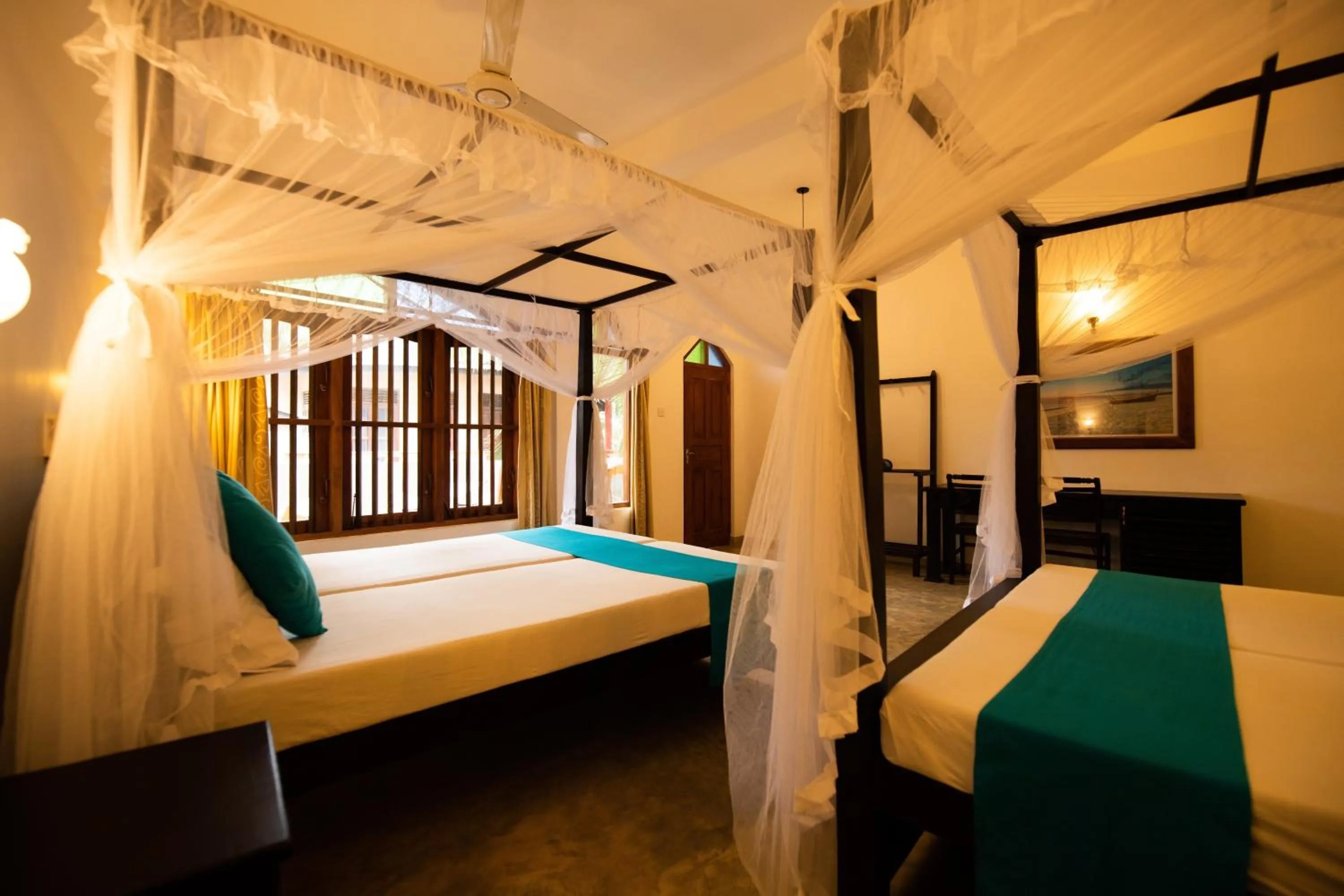 Bed in International Beach Hotel & Restaurant