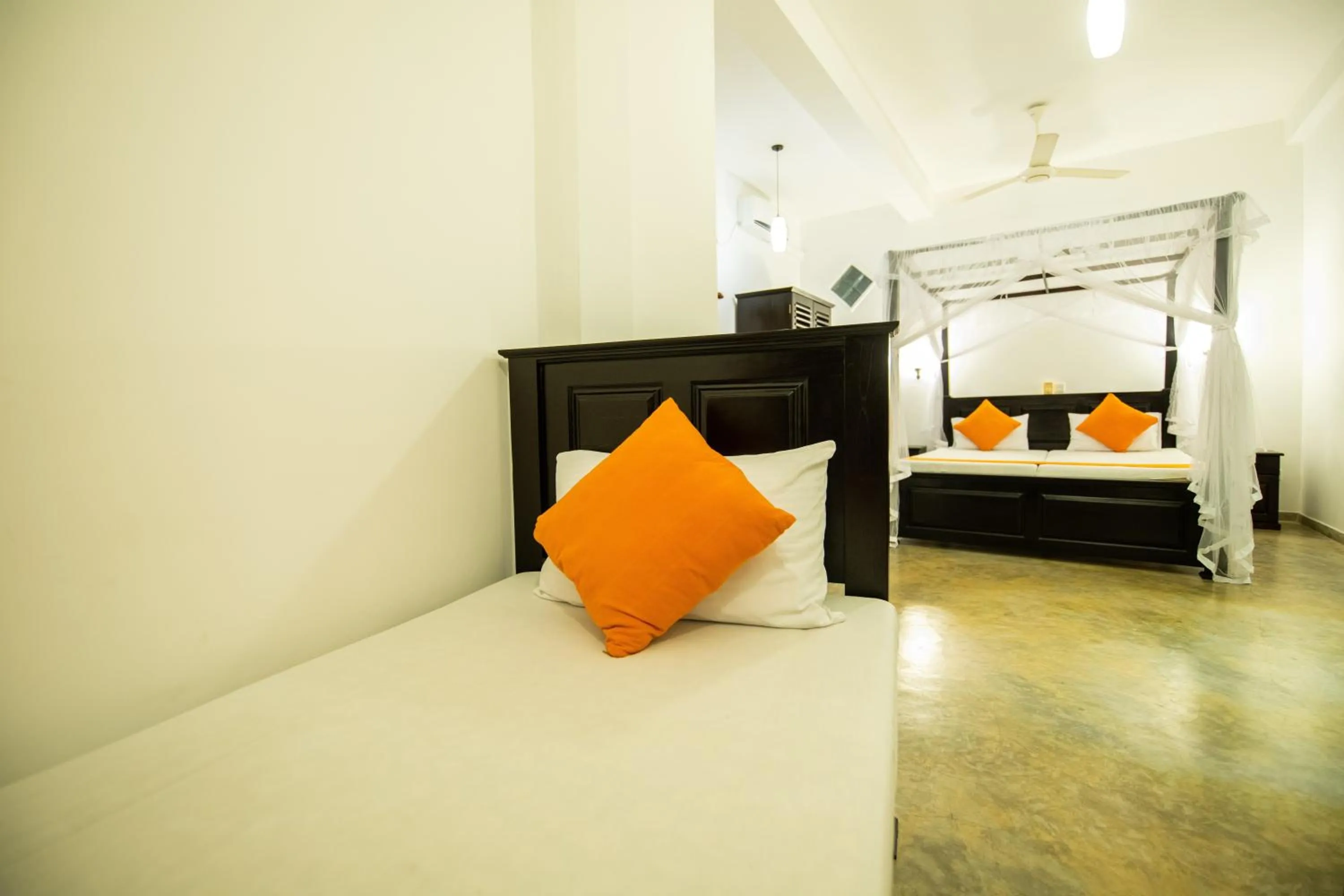 Bed in International Beach Hotel & Restaurant