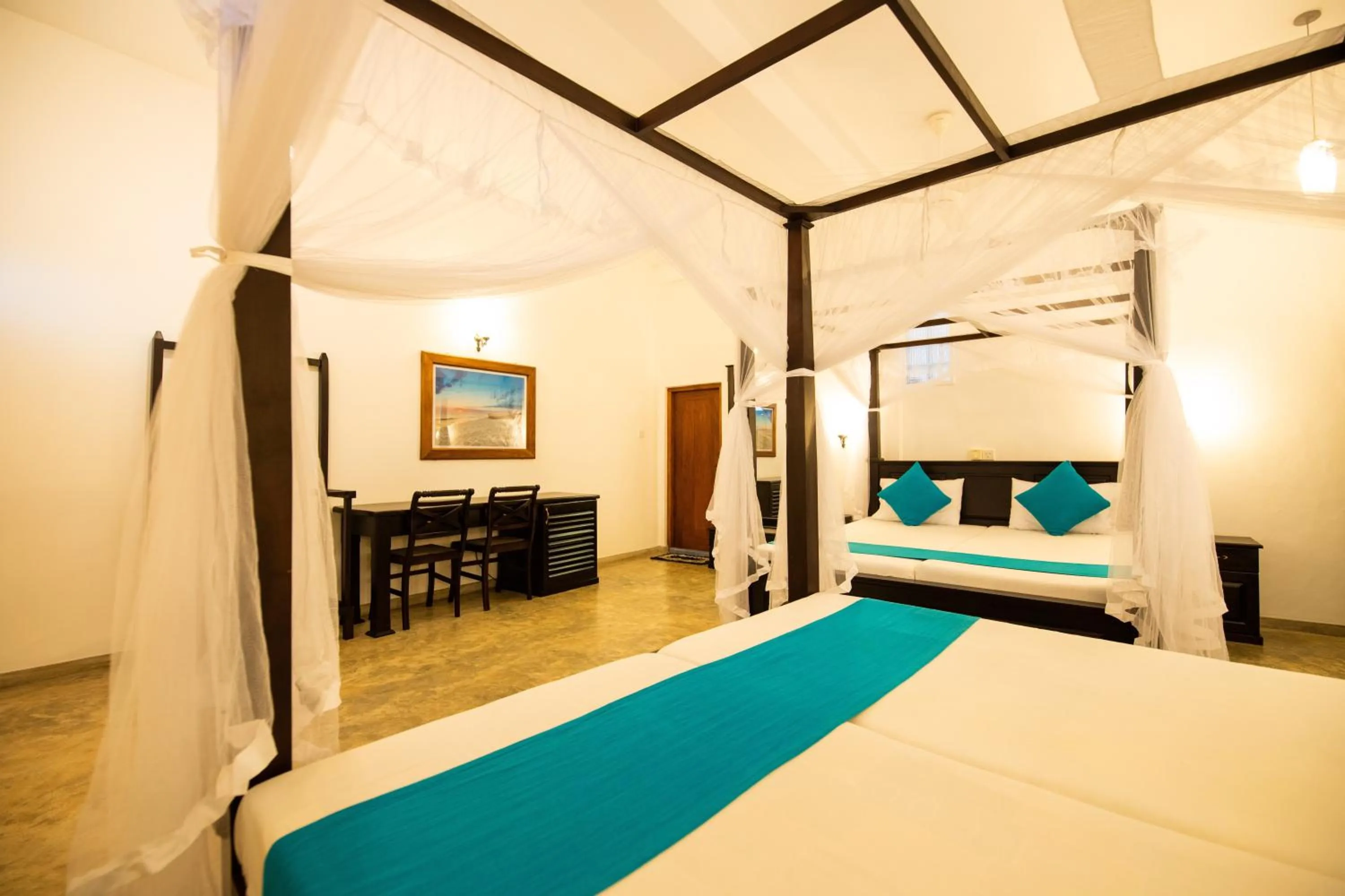 Bed in International Beach Hotel & Restaurant