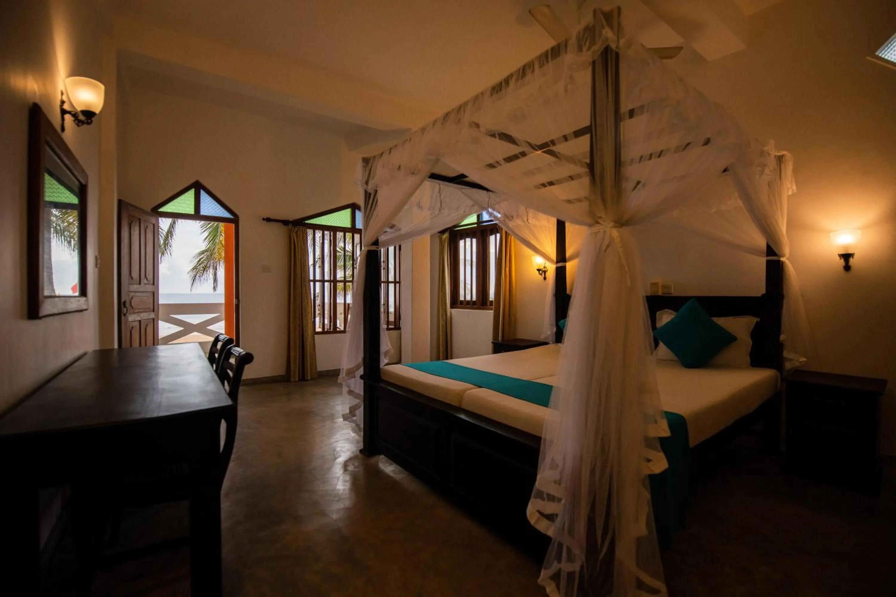 Bed in International Beach Hotel & Restaurant