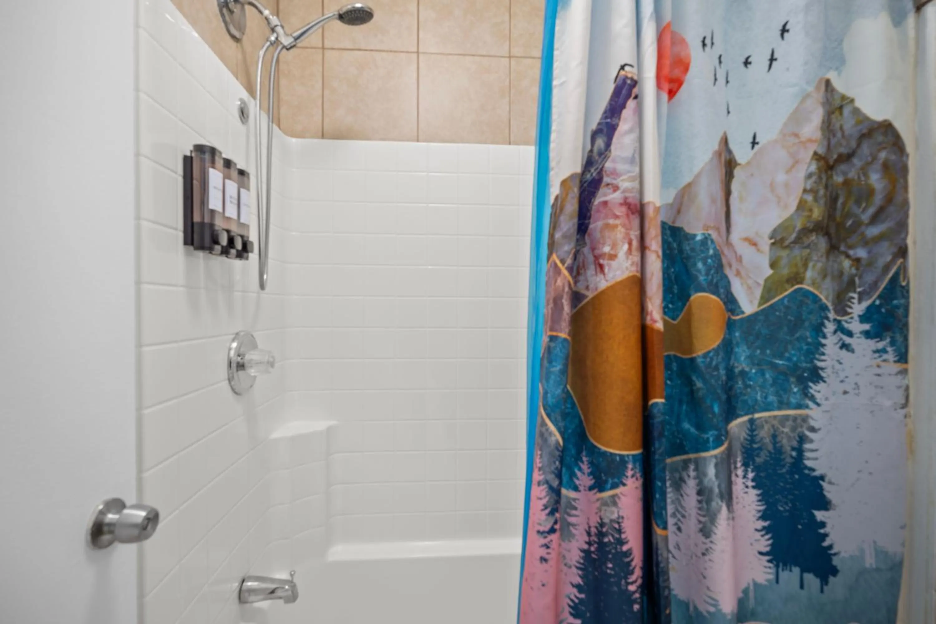 Shower in Bluebird Day Inn & Suites