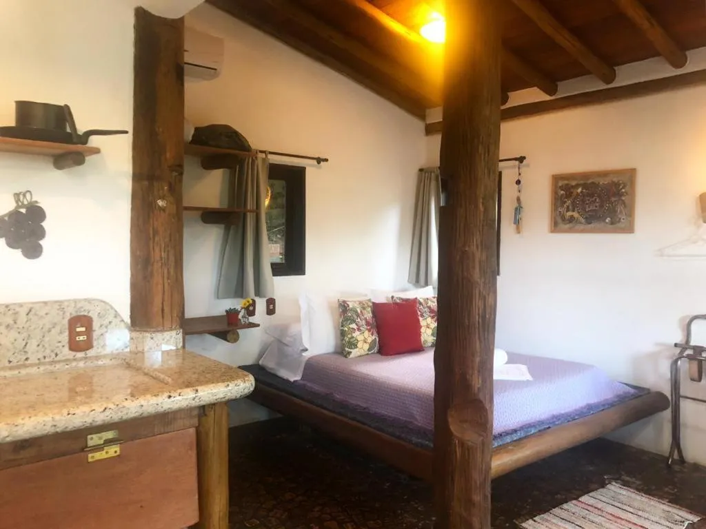 Bed in Pousada Gopak