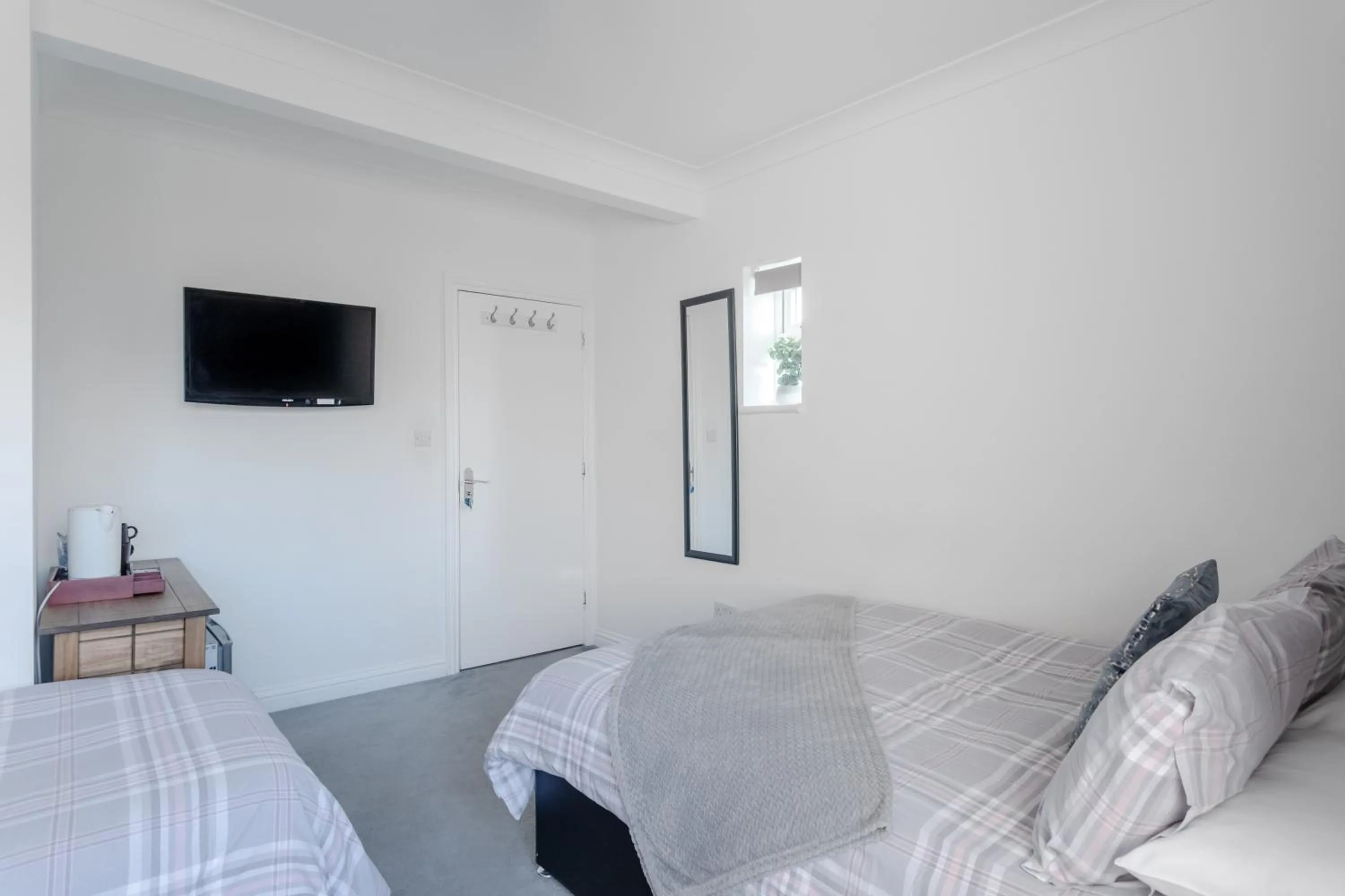 Photo of the whole room, Bed in Apple House Wembley