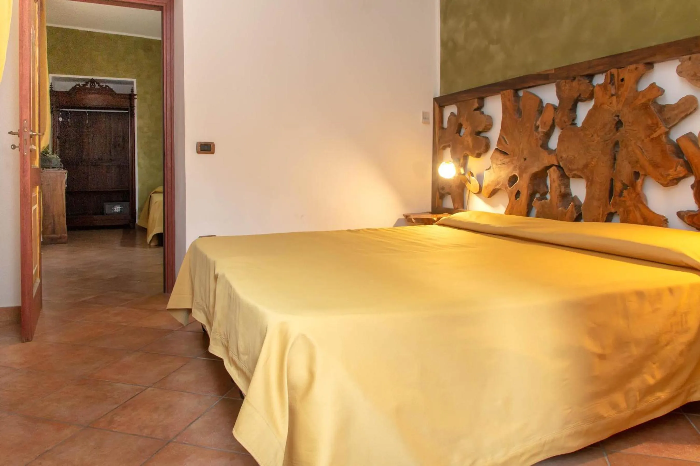 Bed in Donnaciccina Accomodation