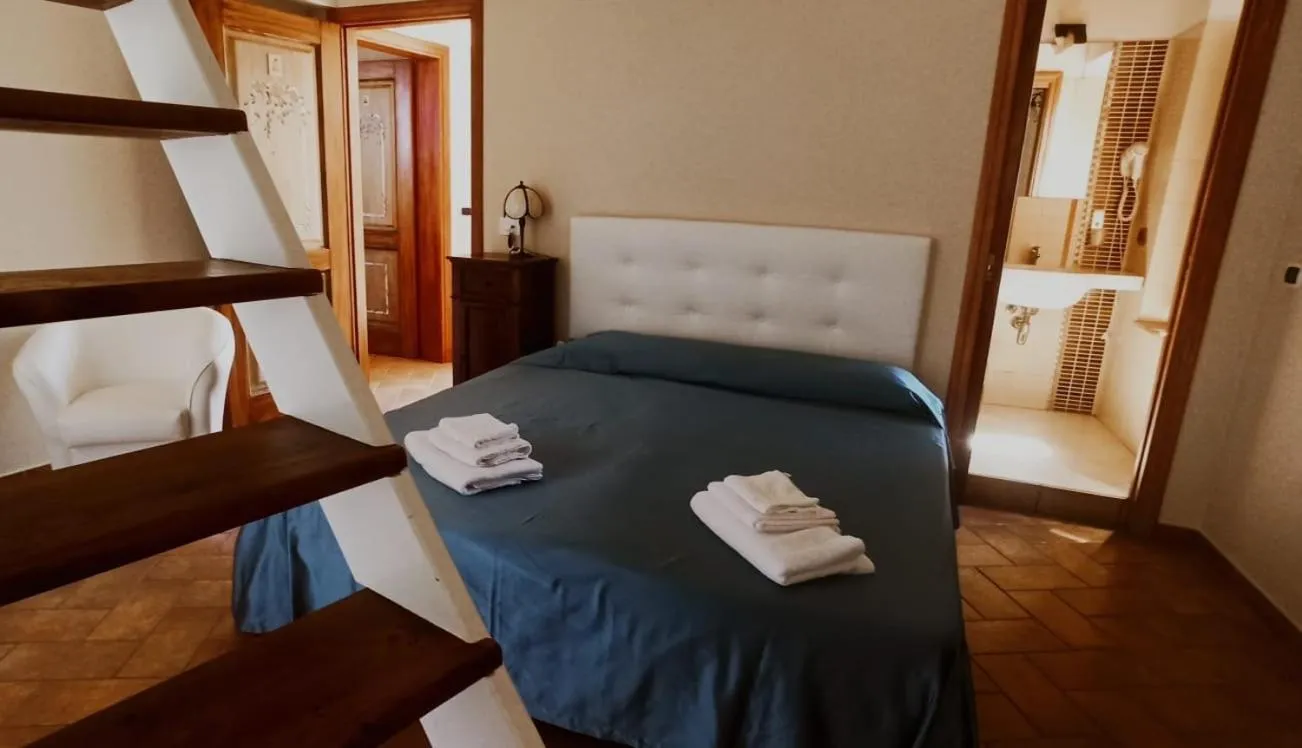 Bed in Donnaciccina Accomodation