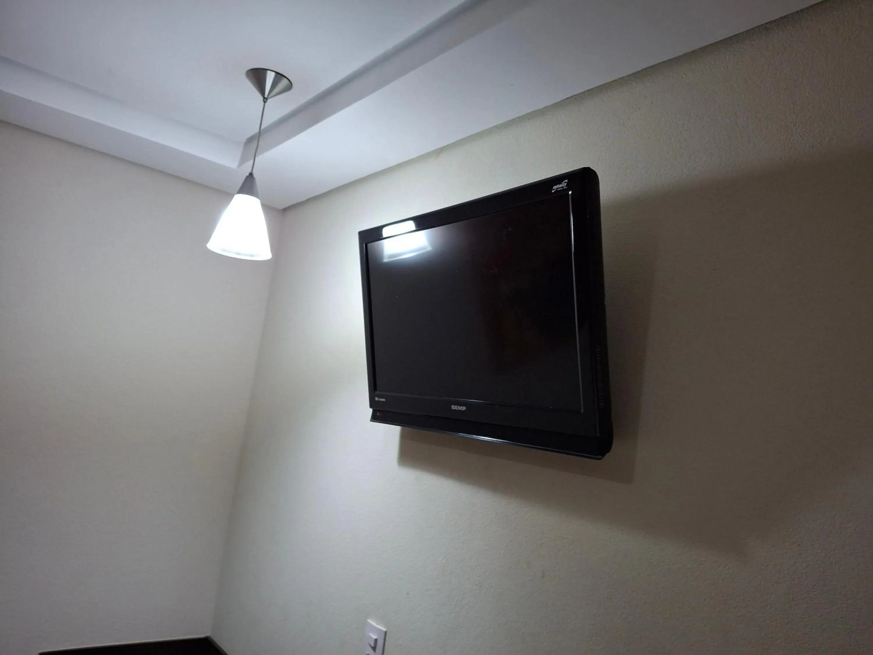 TV and multimedia in Ônix Inn Hotel Cravinhos