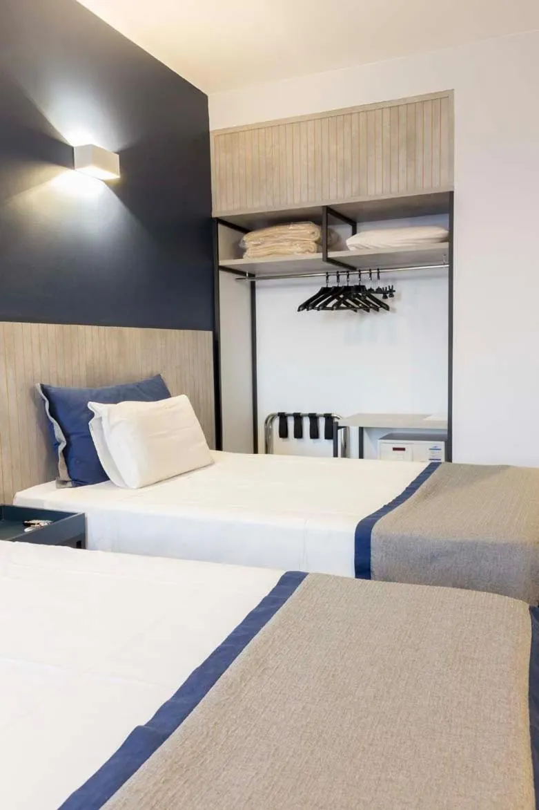 Photo of the whole room, Bed in Transamerica Araraquara