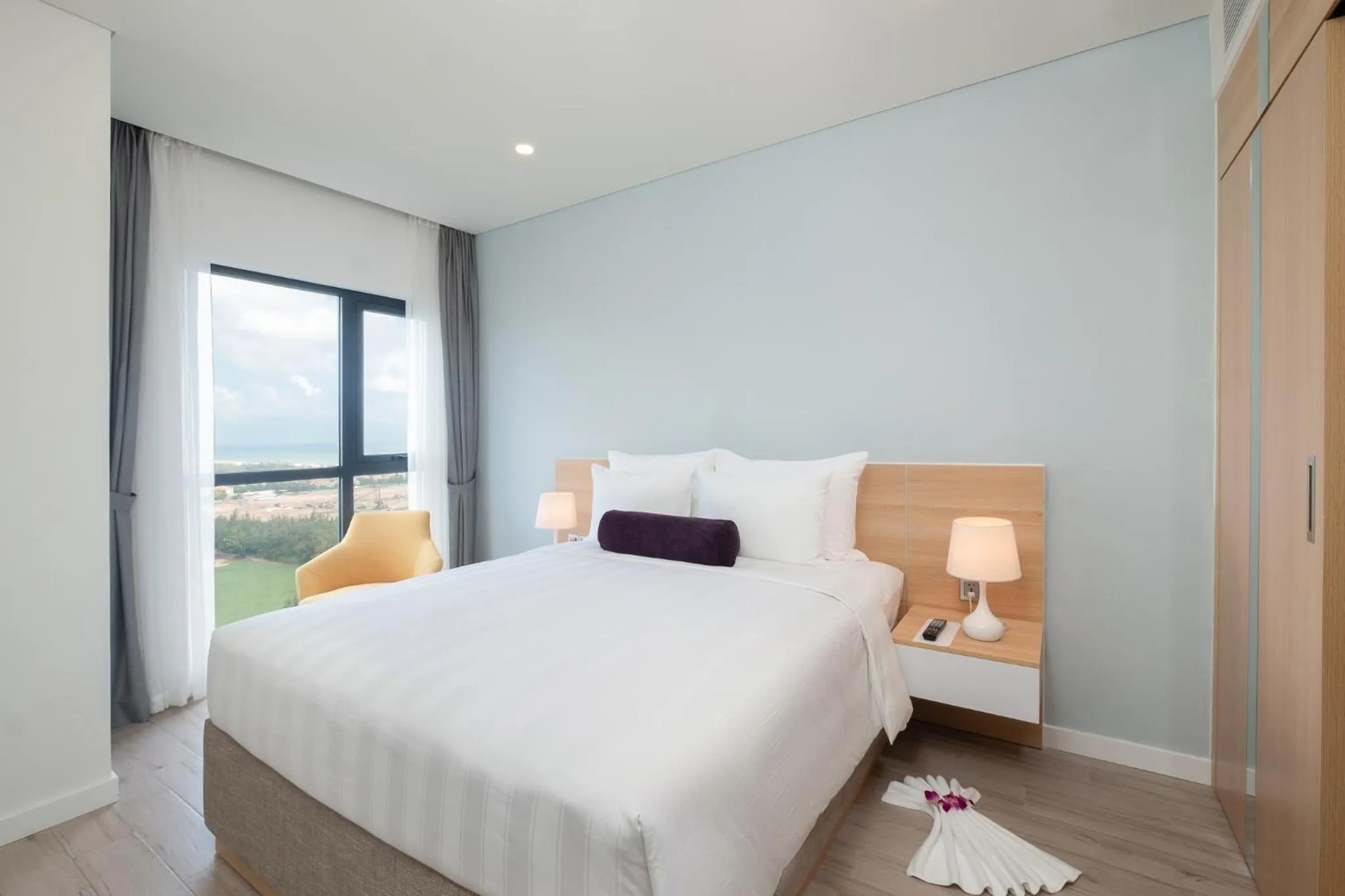 Bed in Carinae Danang Hotel