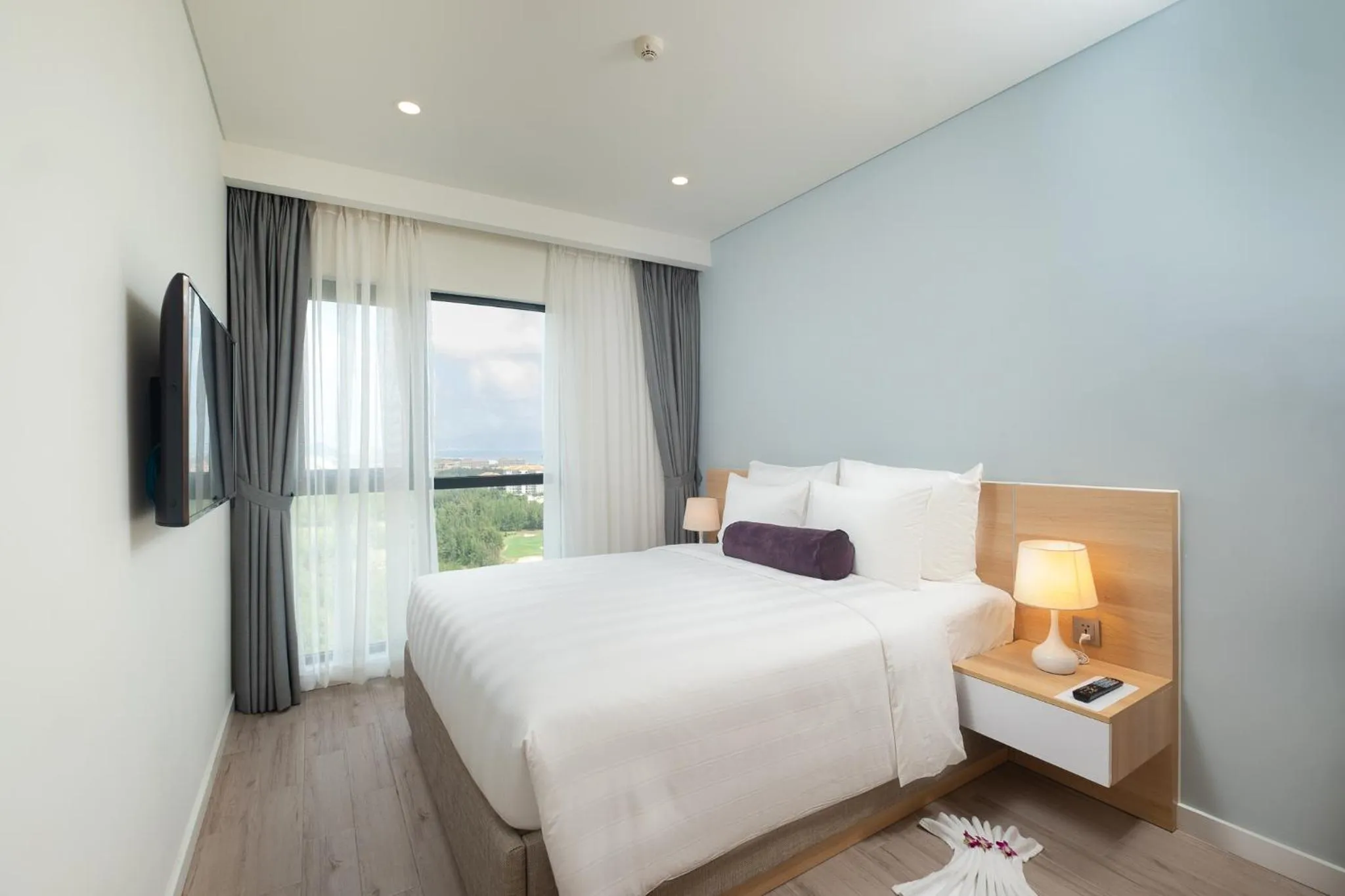 Bed in Carinae Danang Hotel