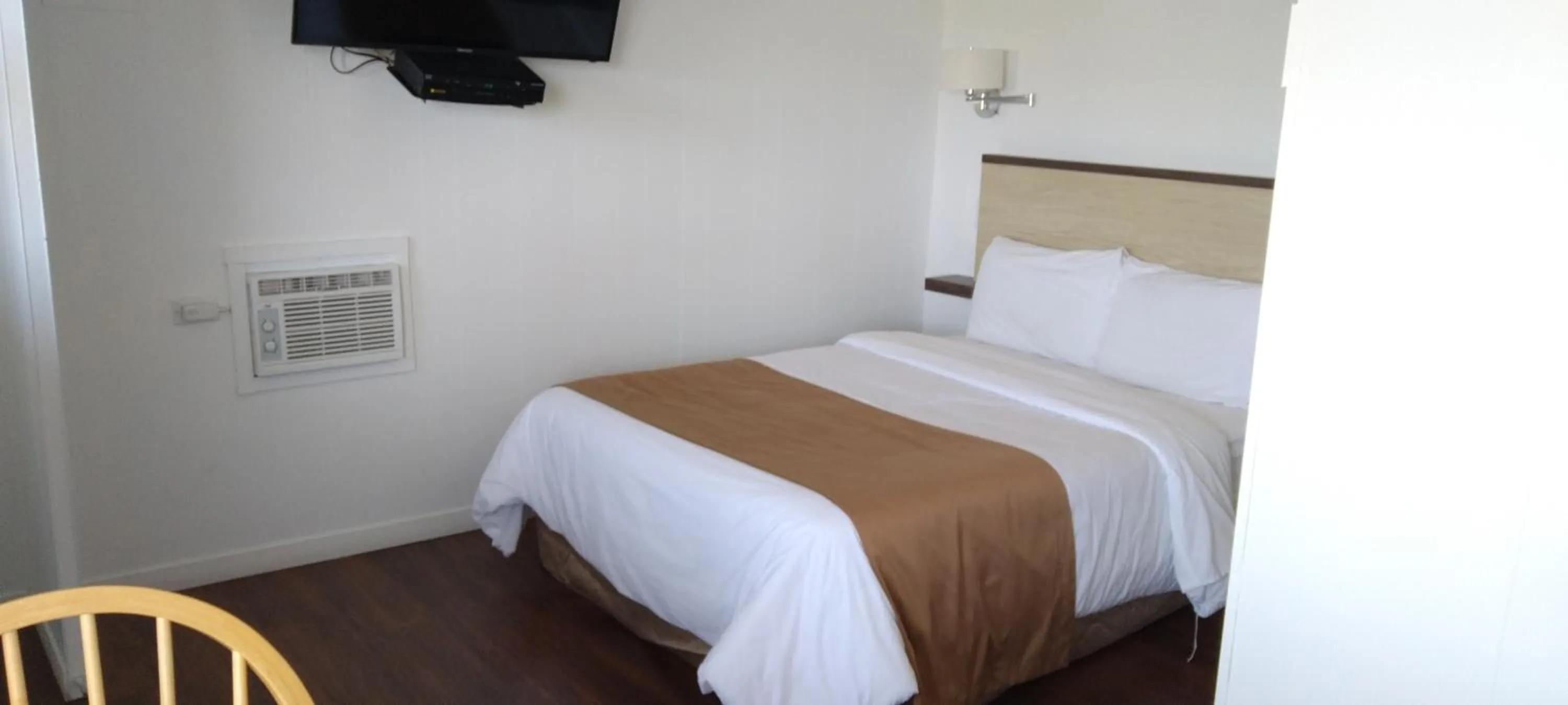 Bed in Motel au Fleuve d'Argent