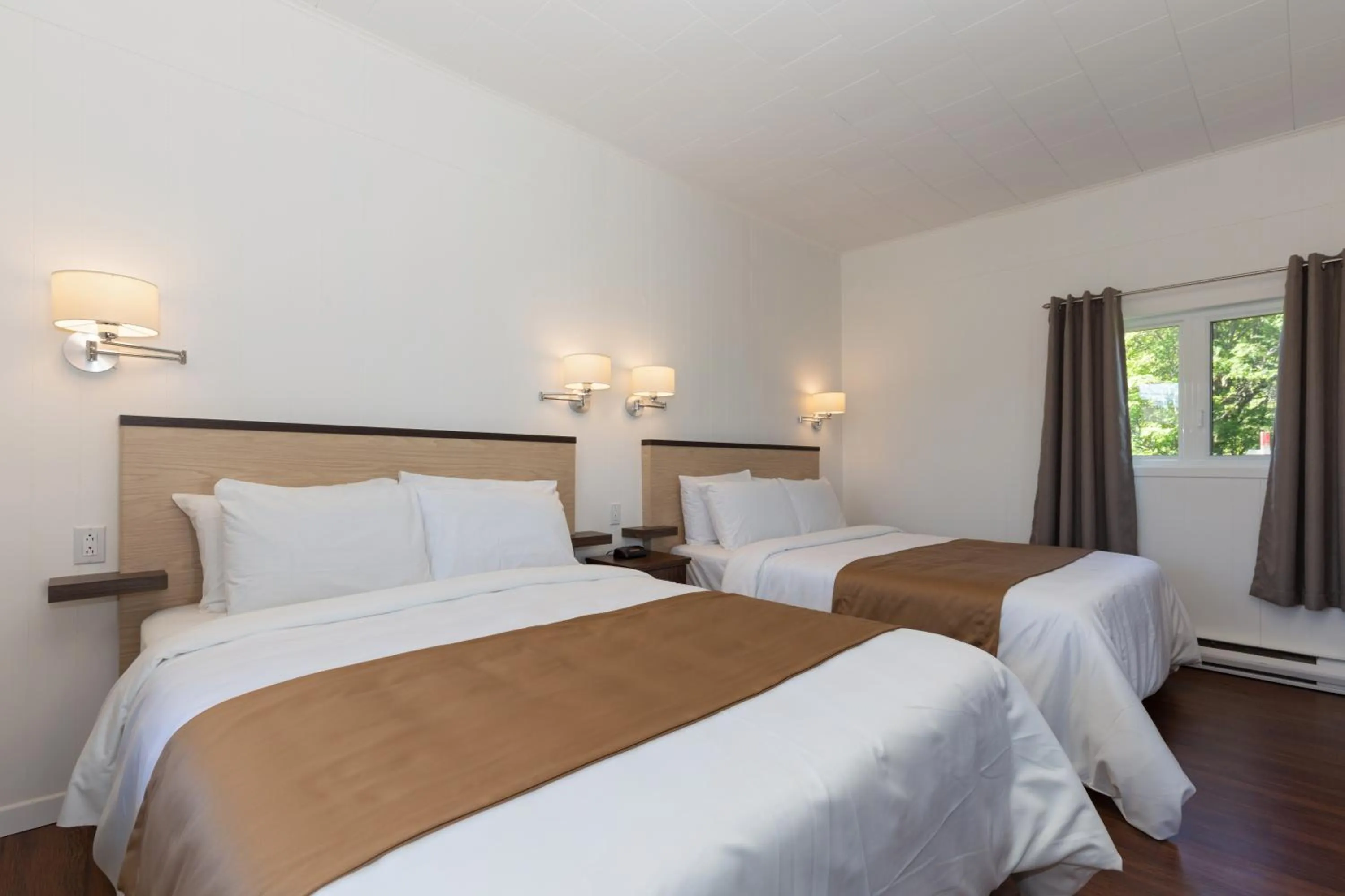 Bed in Motel au Fleuve d'Argent