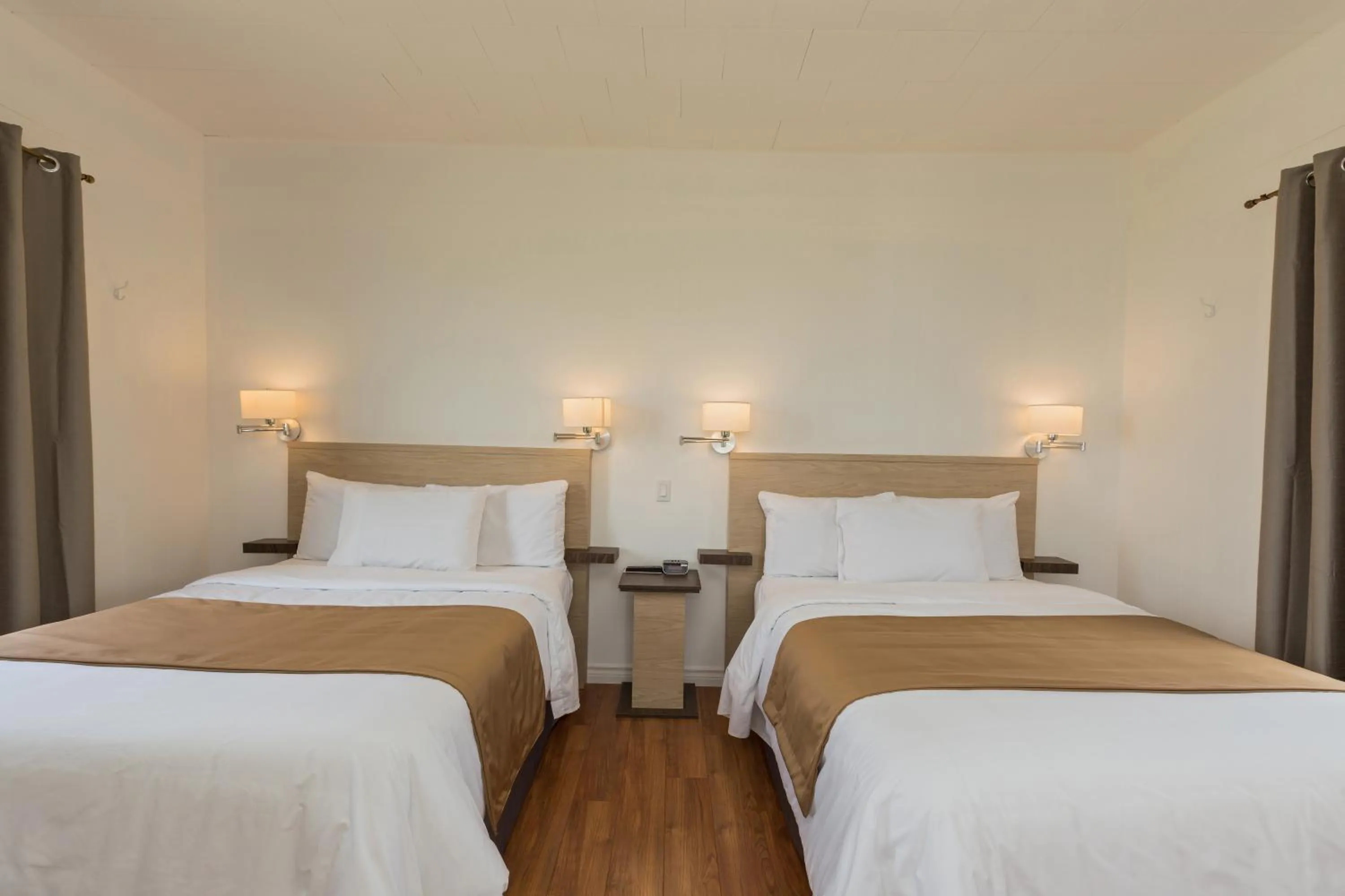 Bed in Motel au Fleuve d'Argent