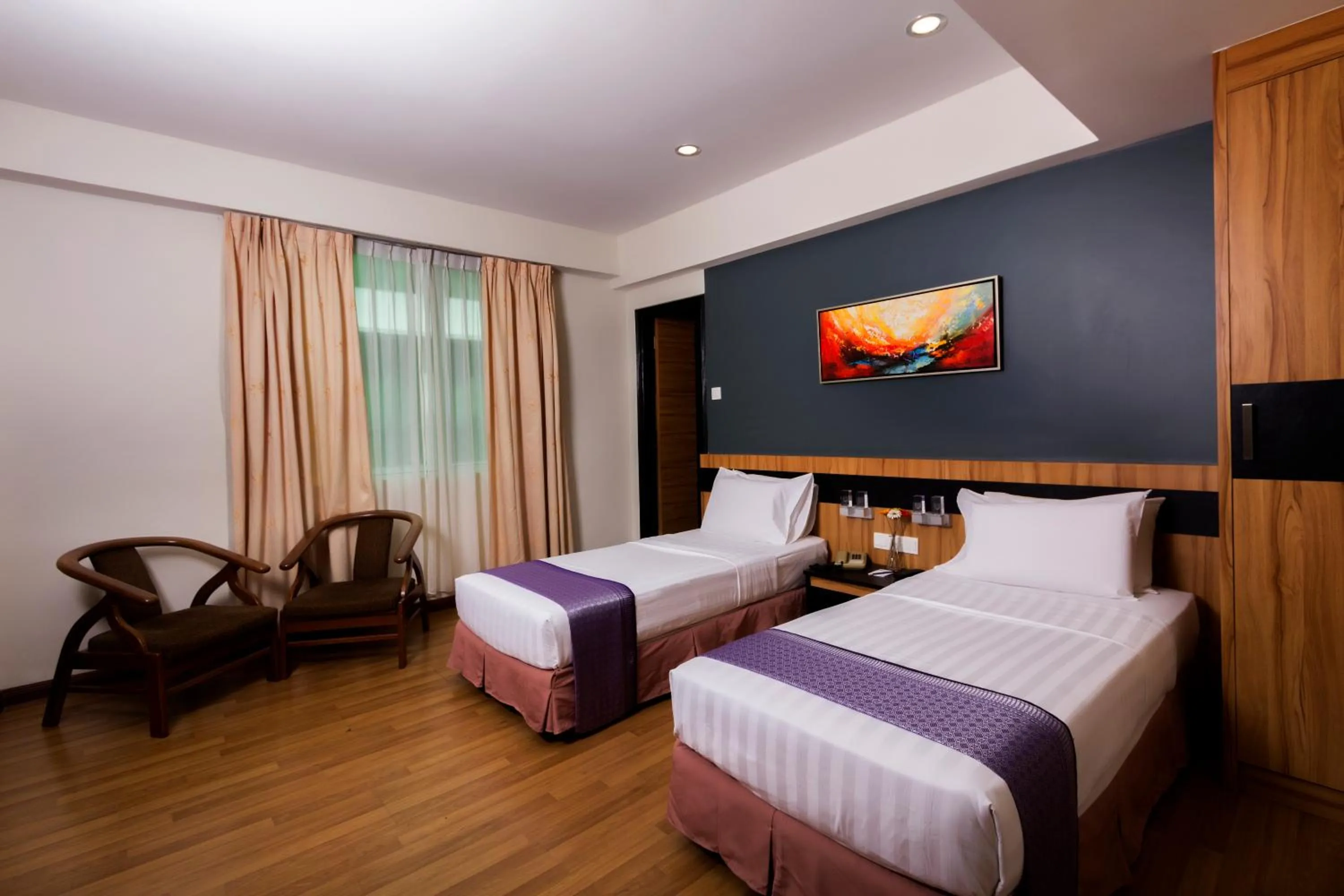 Bed in Mariner Hotel Labuan