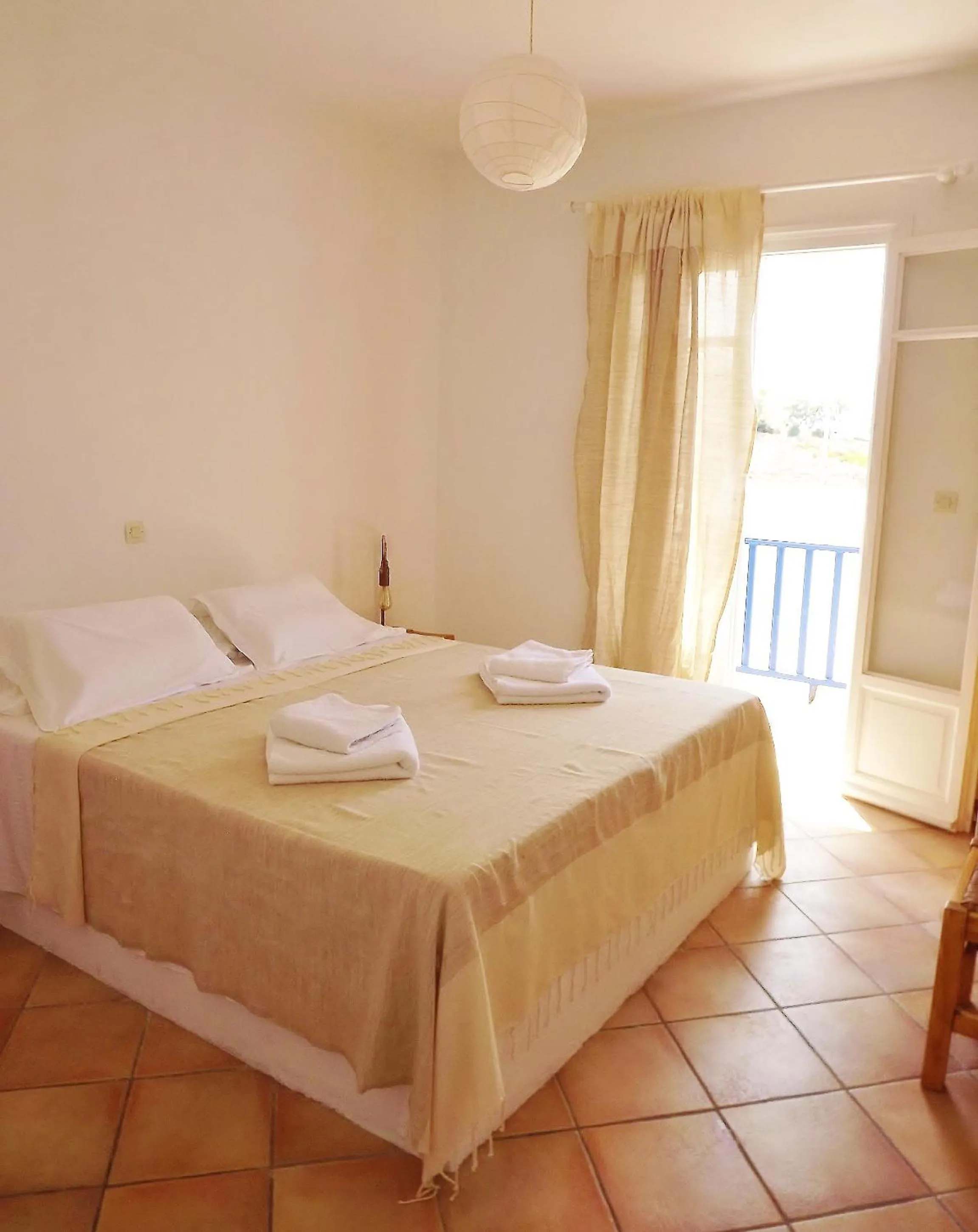 Bed in Votsalo Apartments