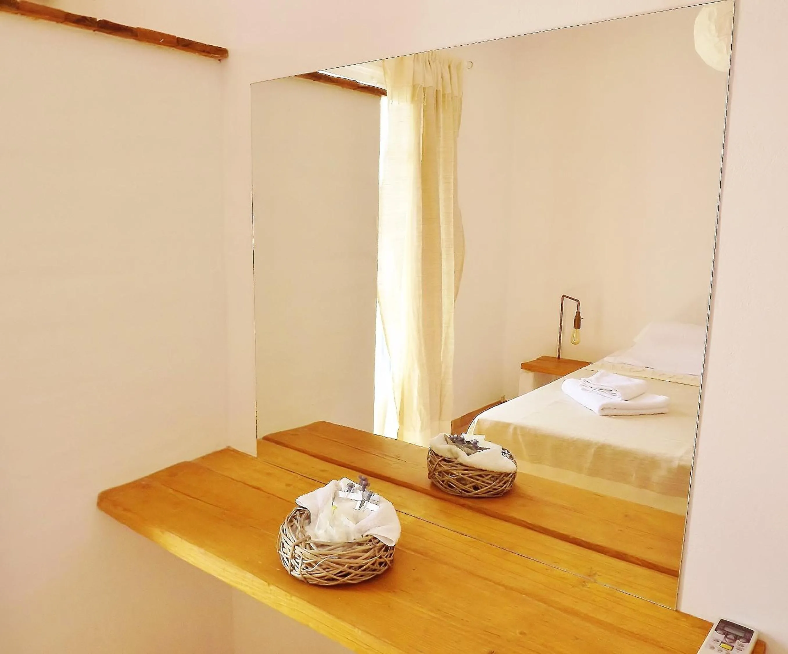 Bed in Votsalo Apartments