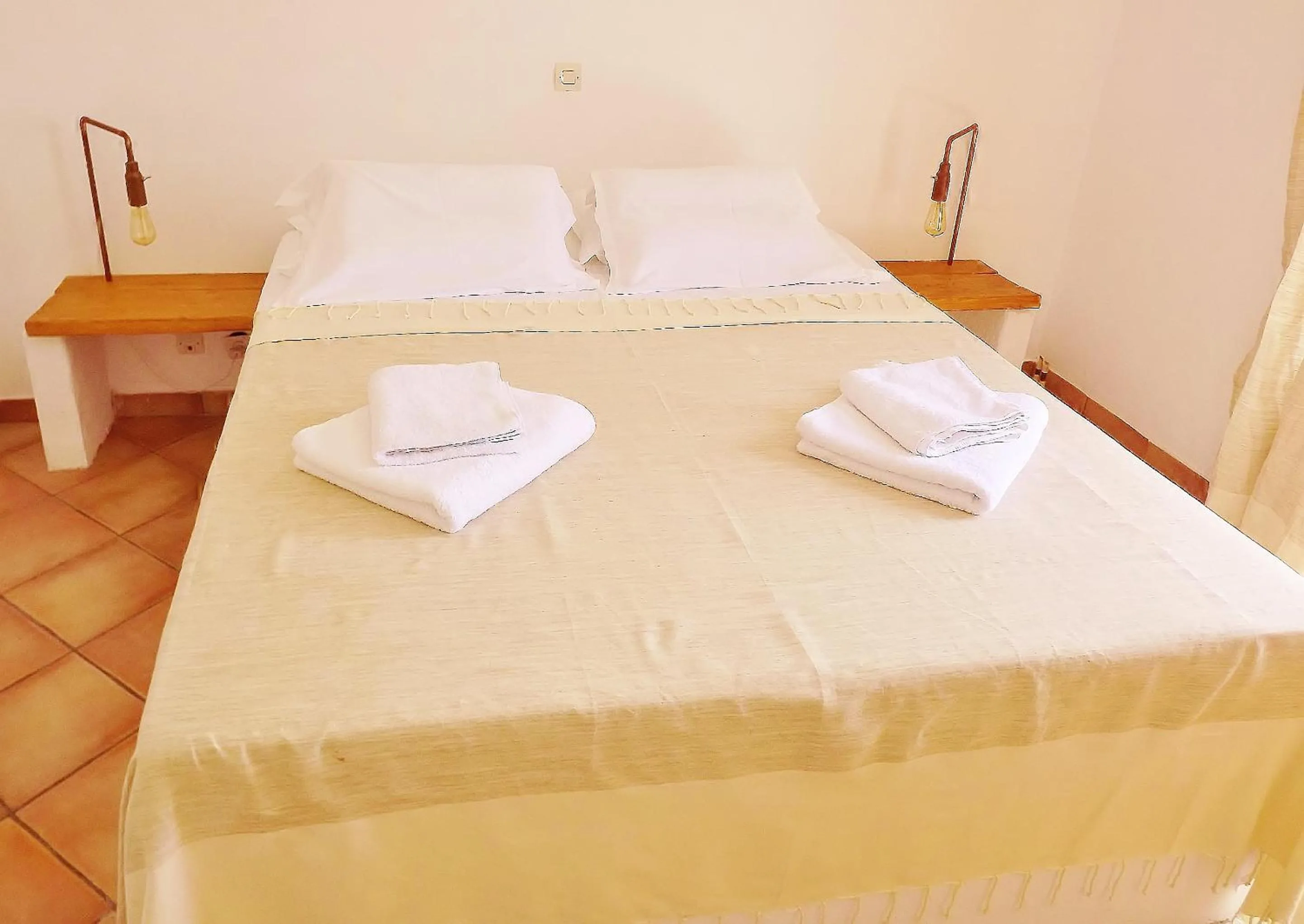 Bed in Votsalo Apartments