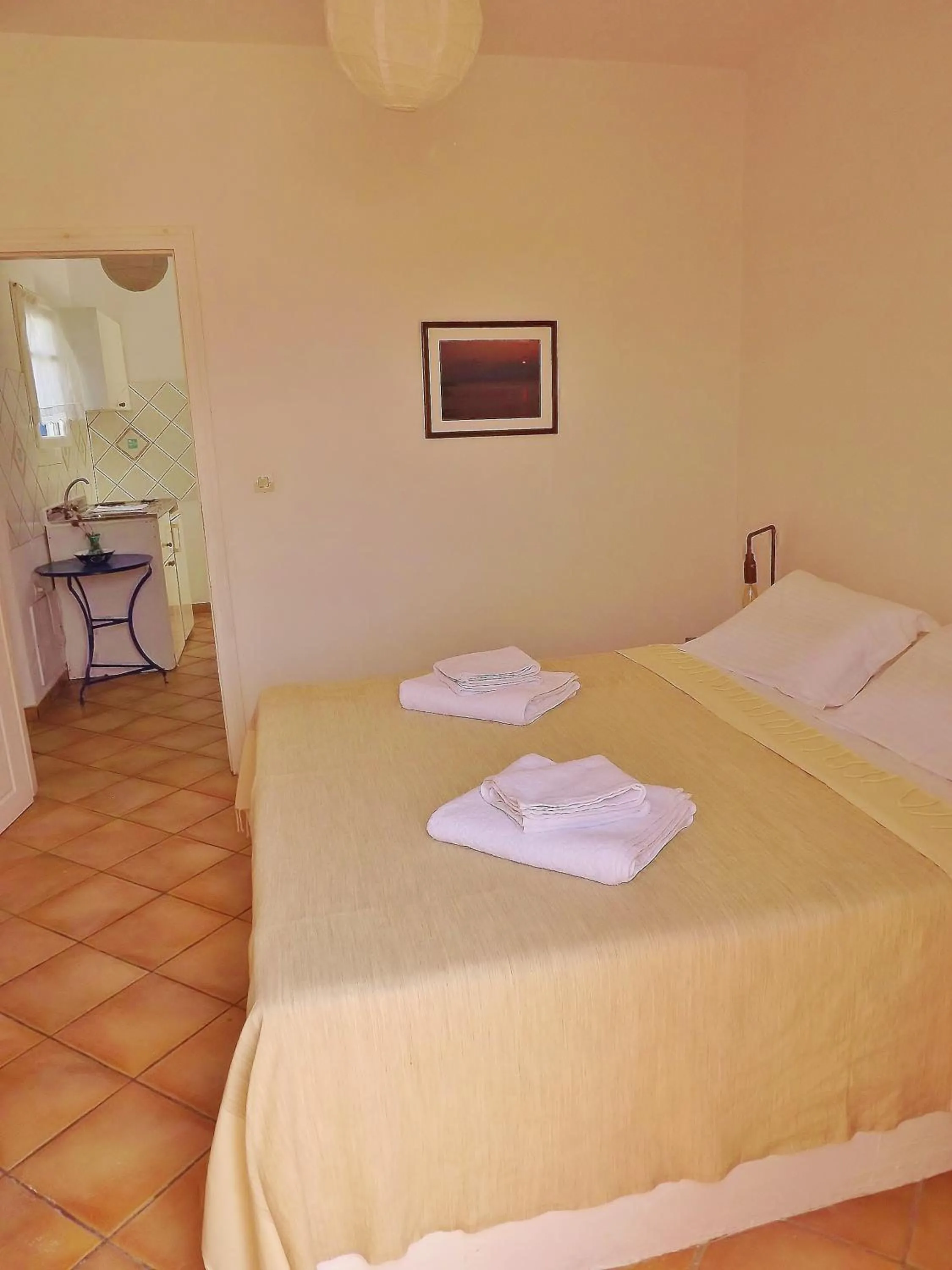 Bed in Votsalo Apartments